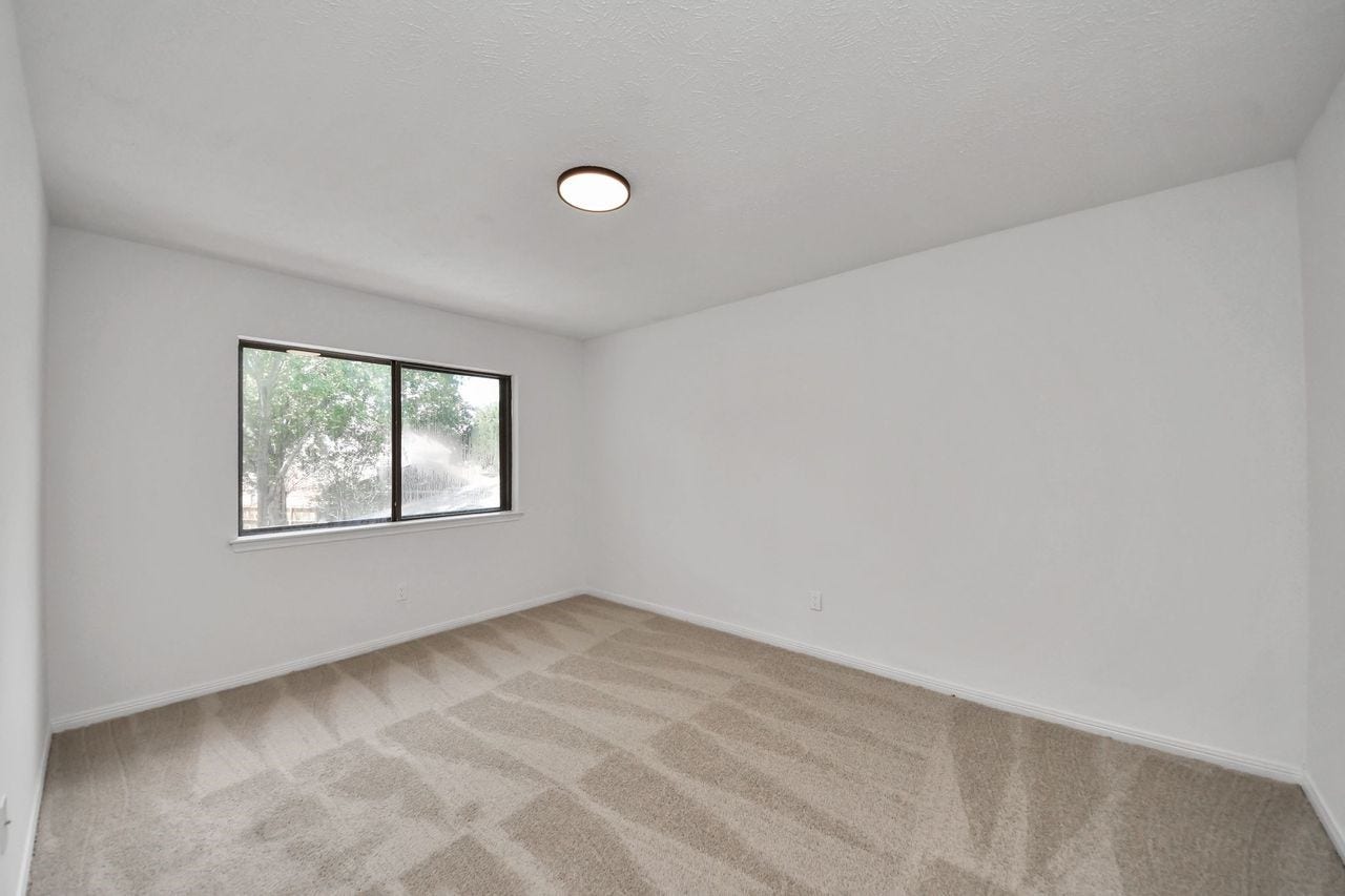 15047 Tramore Drive, Houston, TX 77083 The neutral interior allows plenty of flexibility for creating a bedroom, office, hobby room, or welcoming guest space.