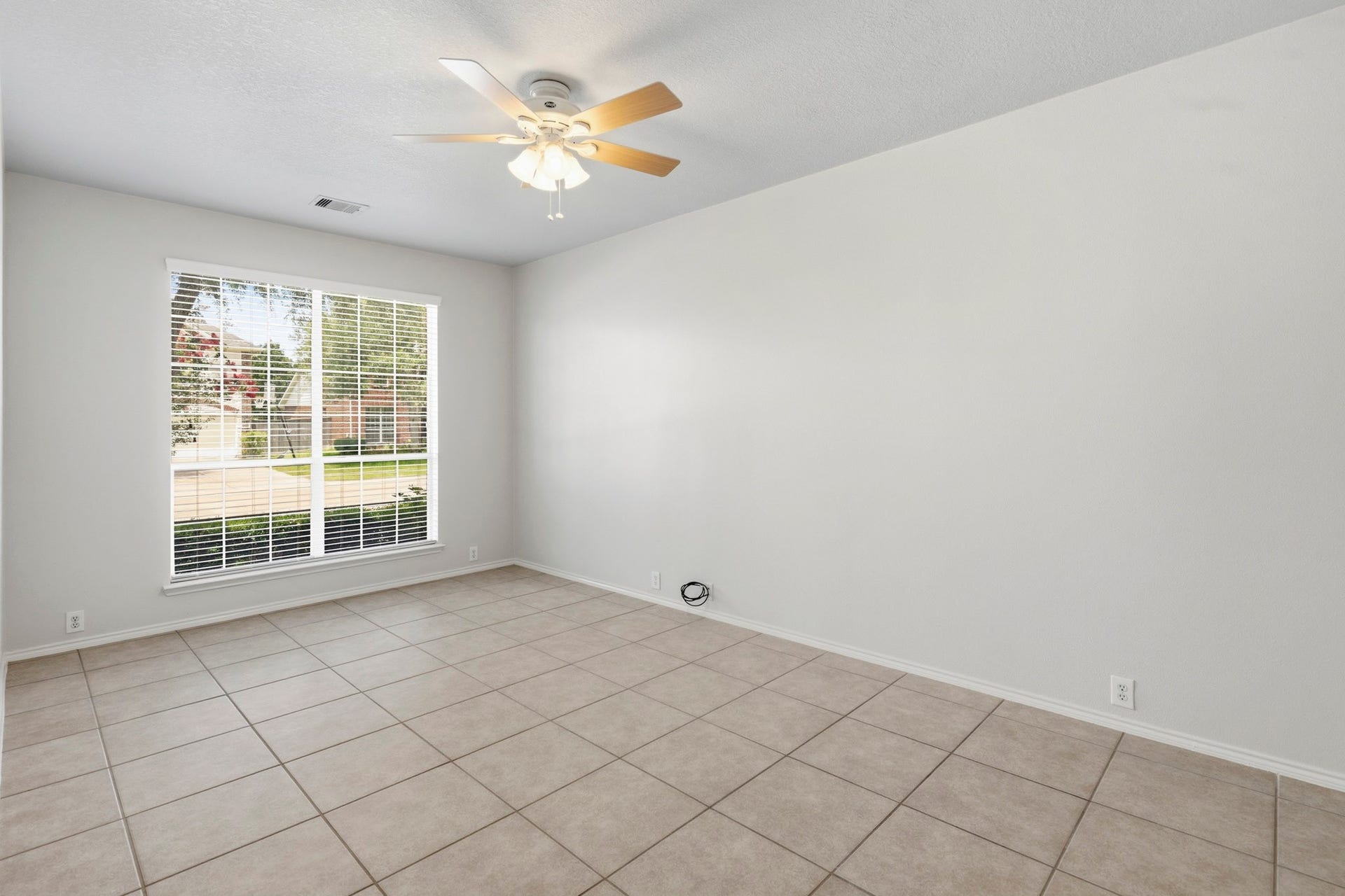 5515 Granite Meadow Drive, Katy, TX 77494 Large private study overlooking the front yard, offering a quiet and comfortable workspace filled with natural light.