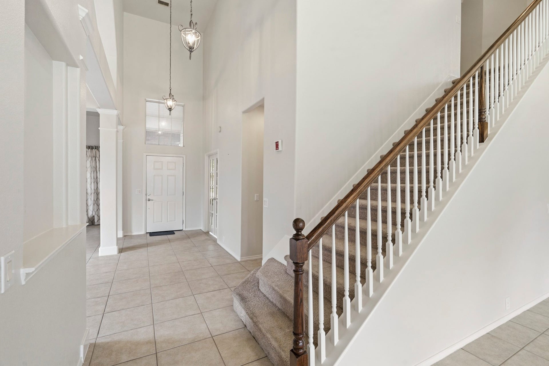 5515 Granite Meadow Drive, Katy, TX 77494 Grand entry featuring French doors leading to a large private study with a walk-in closetideal as a home office or potential fifth bedroomwith convenient access to the powder bath.