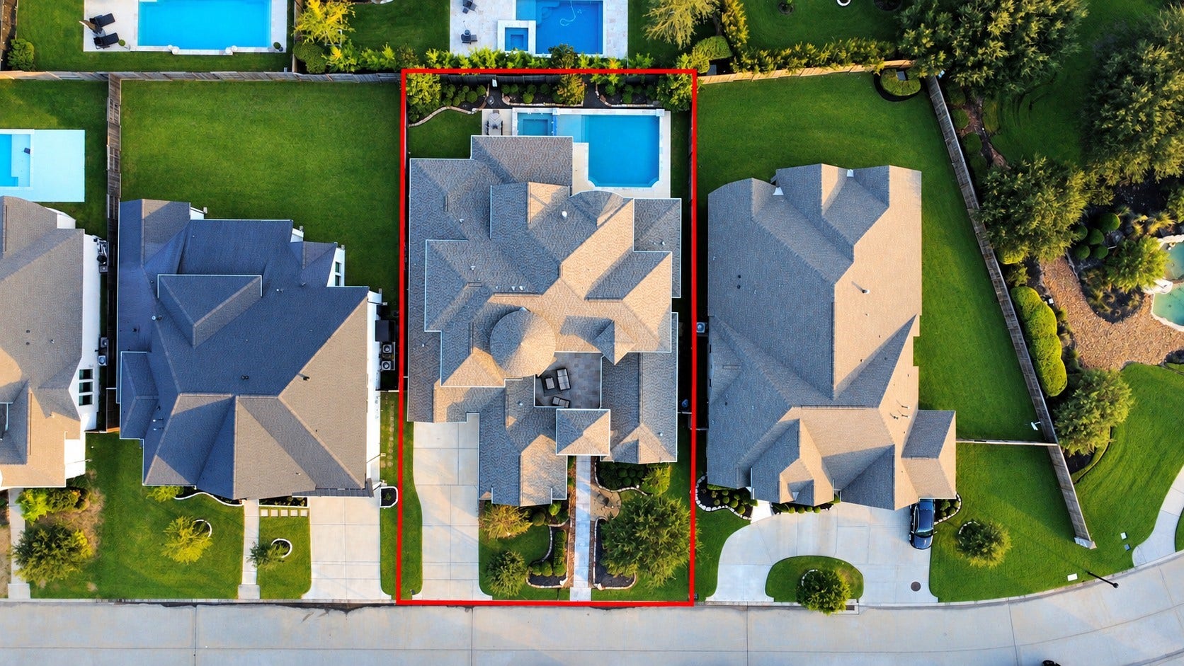 12821 N Palomino Lake Circle, Cypress, TX 77429 Aerial view of this stunning 5,142 sq. ft. home featuring 5 bedrooms, 4 full bathrooms, a split 3-car garage, and a 10,800 sq. ft. lot. Built in 2017, with a roof replaced in 2022 and a resort-style pool and spa added in 2022.