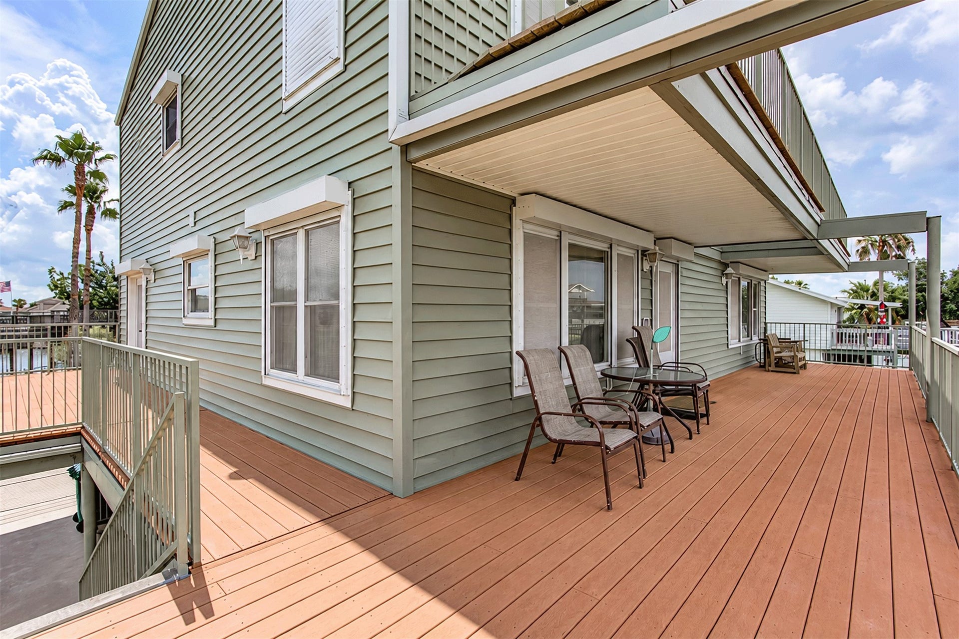 7 S Skimmer Street, La Marque, TX 77568 Large Trex deck wrapping the home, low-maintenance and built for coastal living.