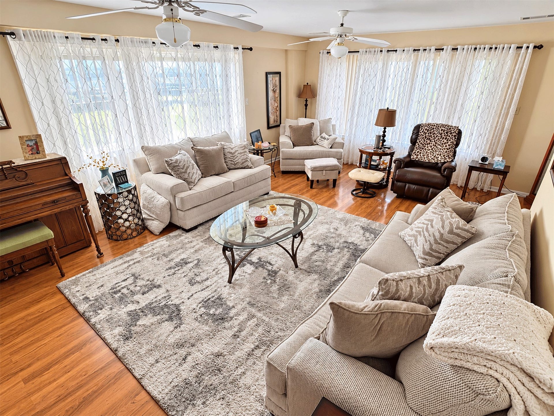 7 S Skimmer Street, La Marque, TX 77568 Bright first-floor living room with wood floors and abundant natural light.