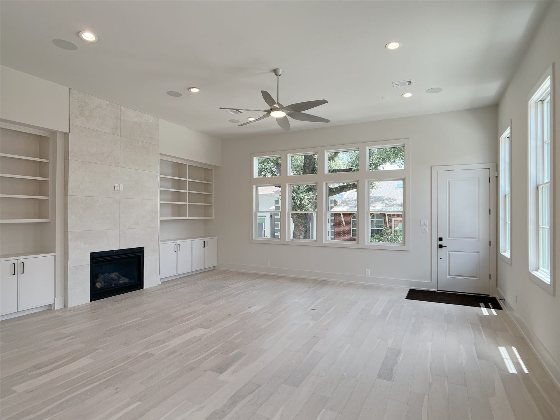 large modern ceiling fan; scenic views from living room windows