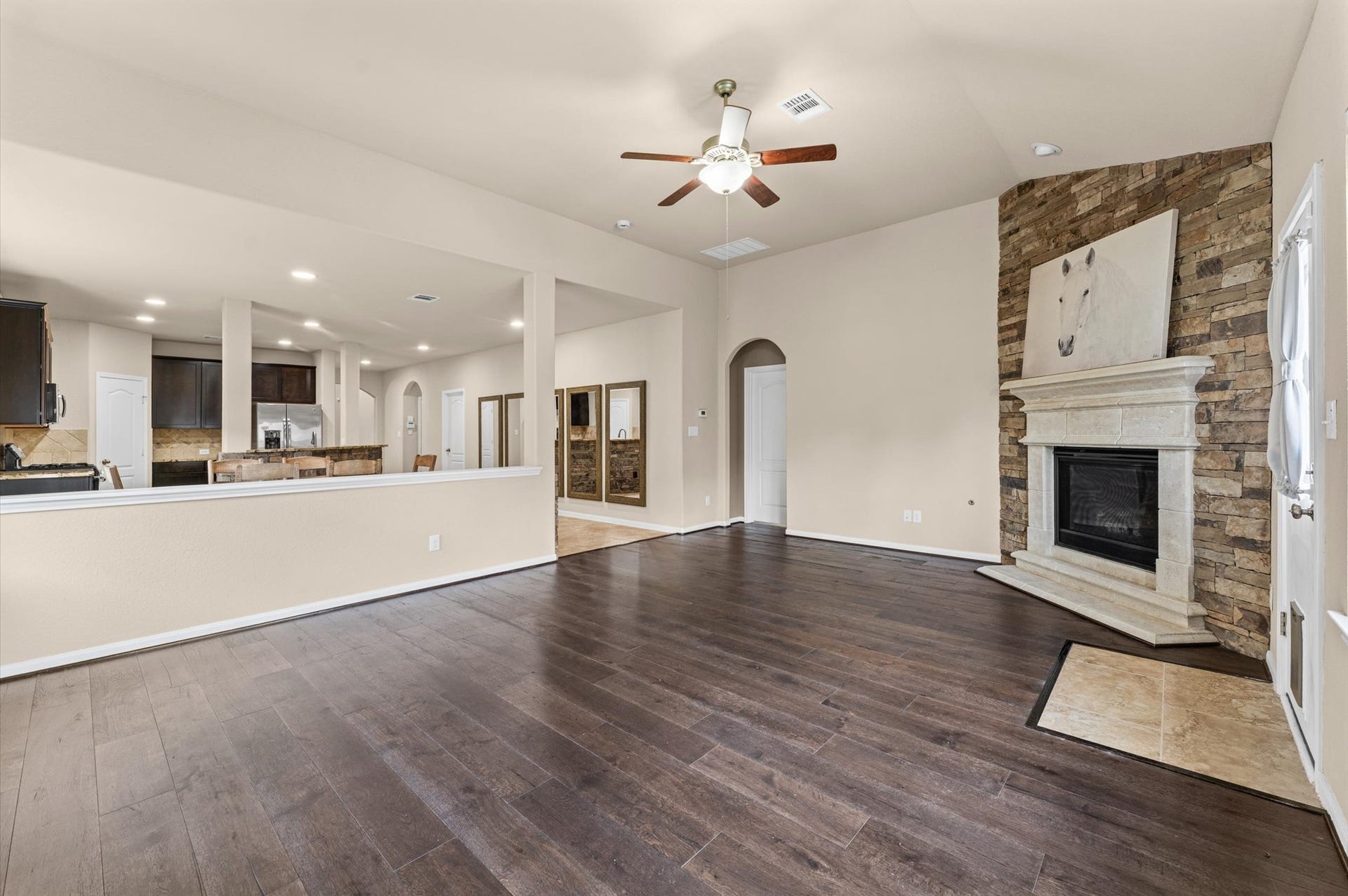 Step inside to the 21x16 family room, built around the fireplace.
