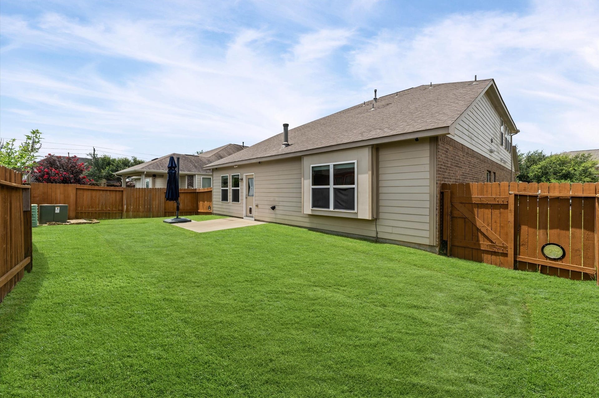 Fenced and finished with mostly turf, so there's hardly any mowing.
