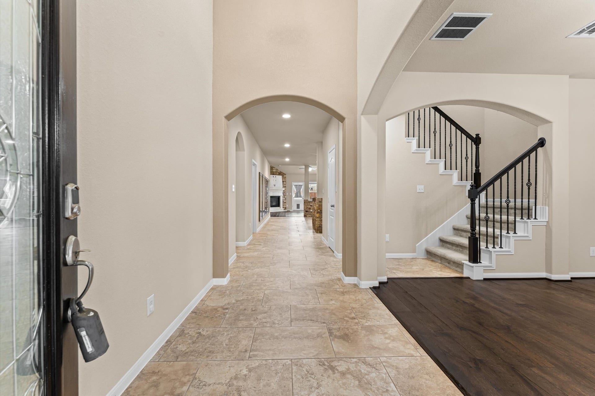 Engineered wood and tile run throughout the first floor.
