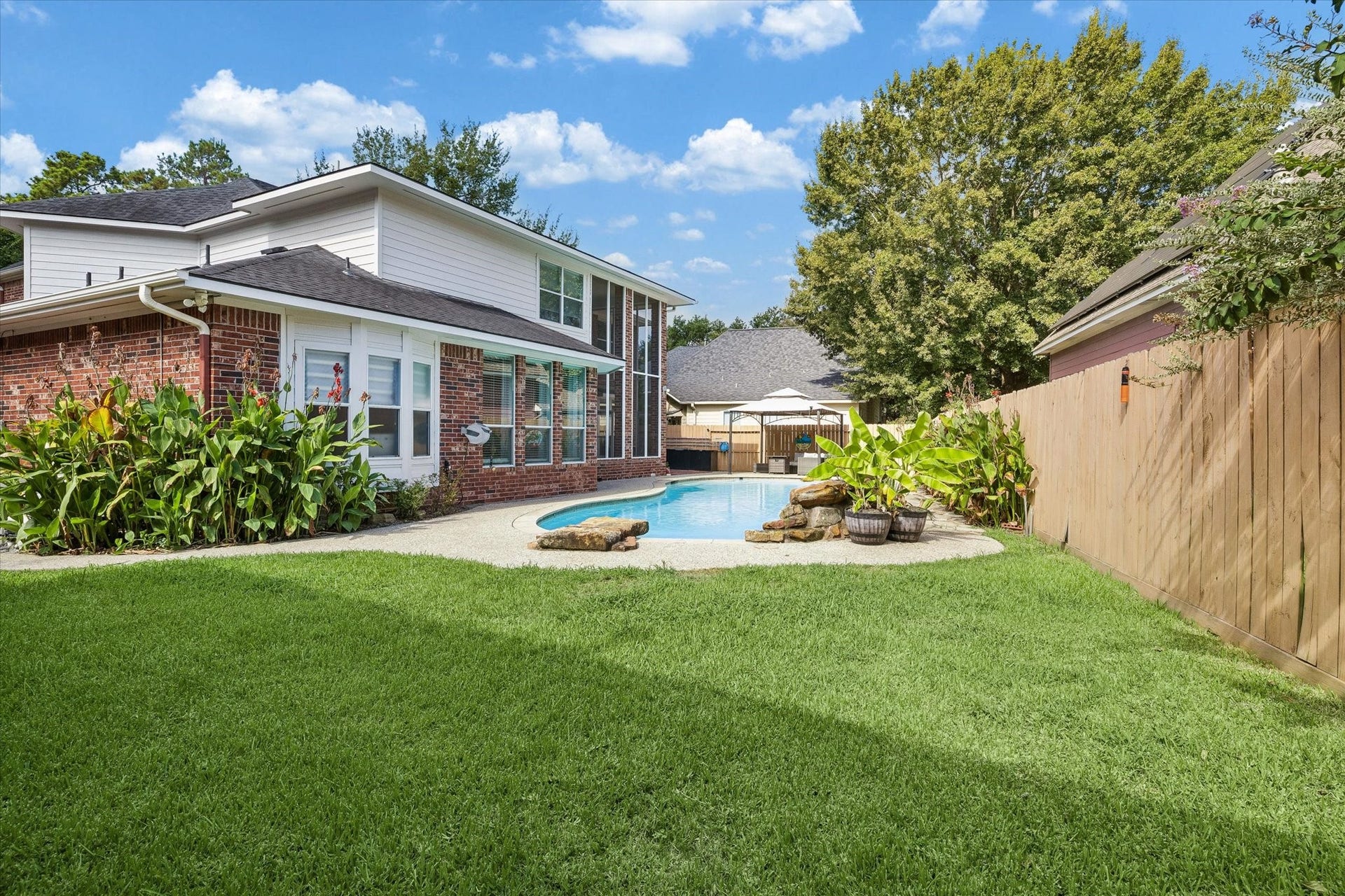 11510 Pecan Canyon Court, Tomball, TX 77377 Play space next to pool