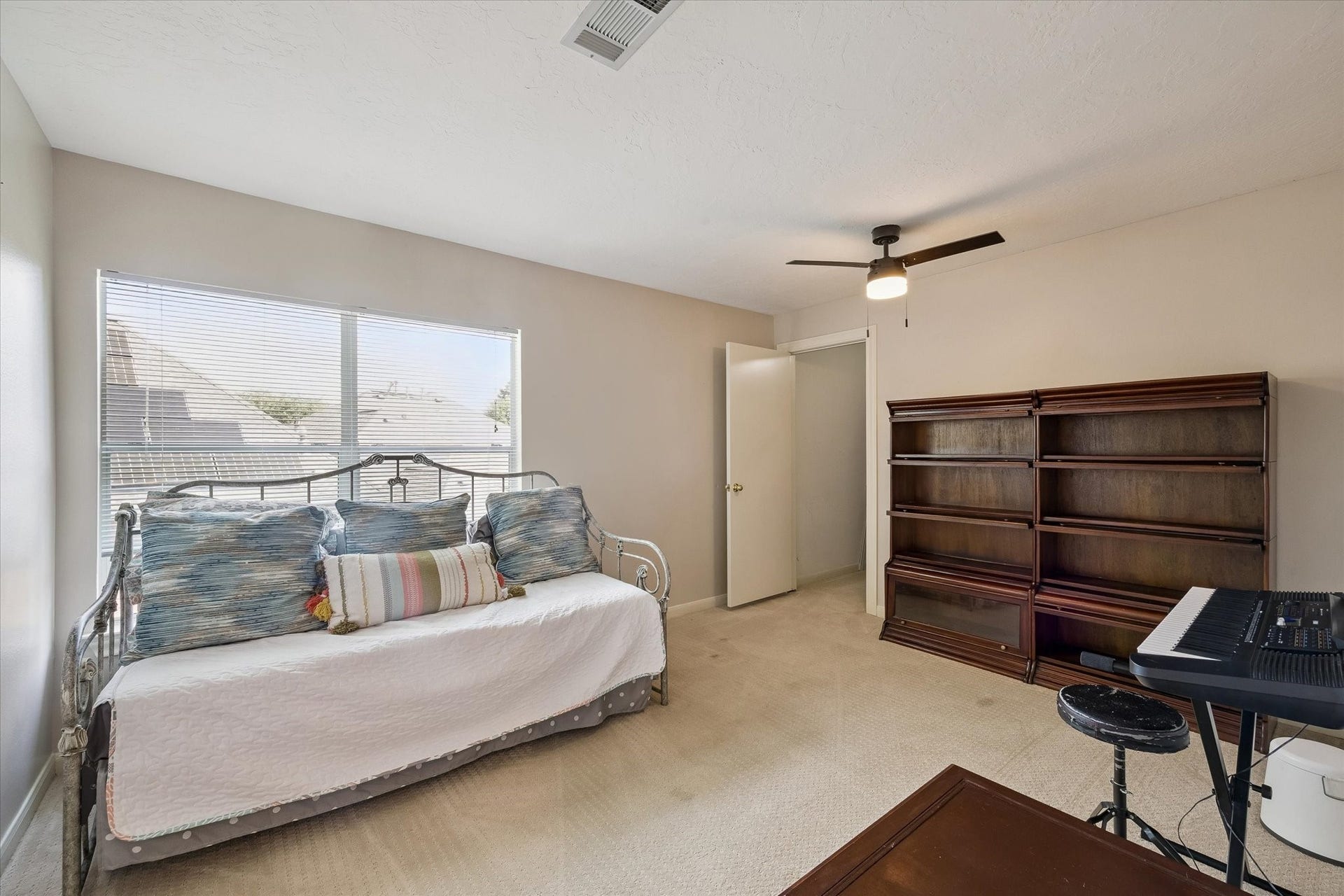 11510 Pecan Canyon Court, Tomball, TX 77377 This bedroom has a huge walk in closet and views of the pool