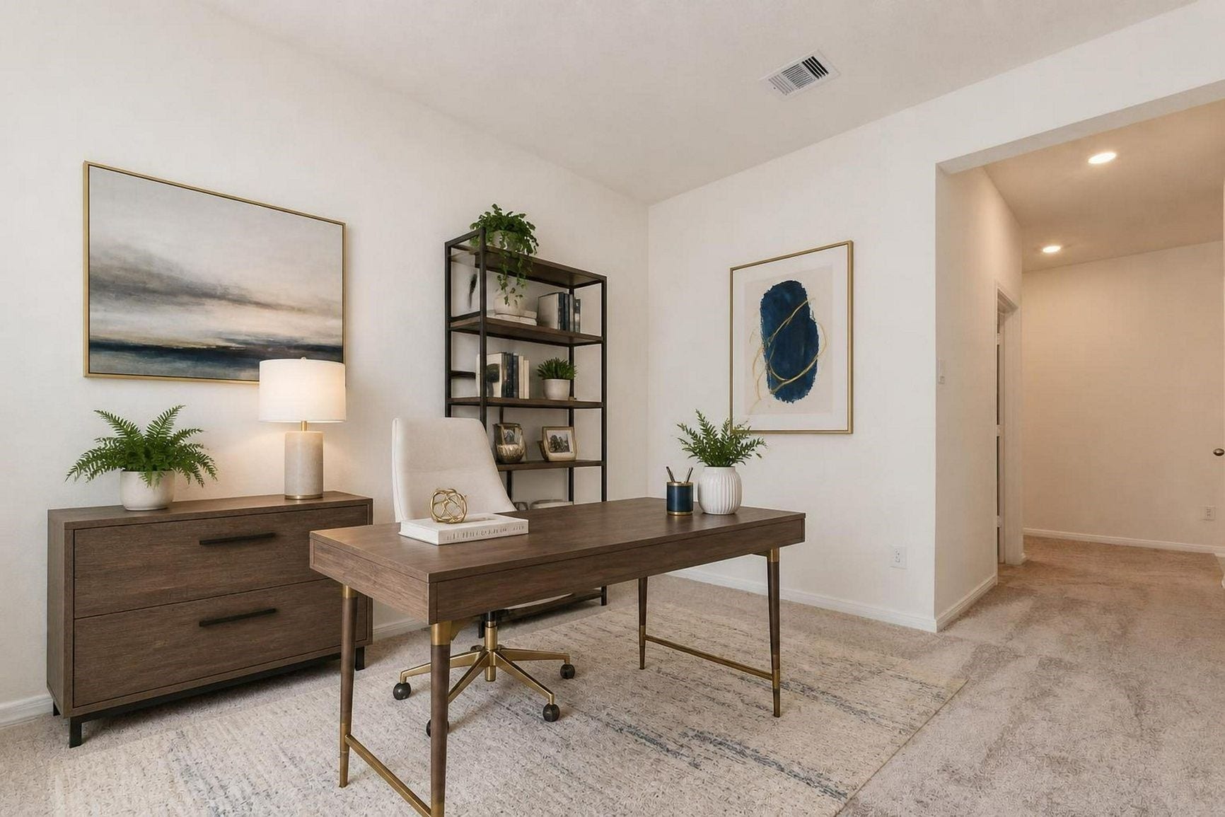 Virtually staged. The den off the entry is shown as a home office.