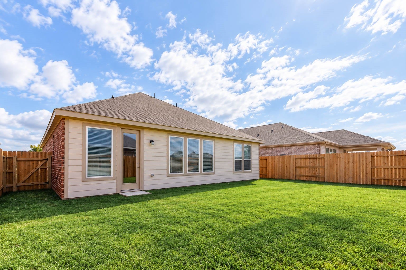An angled view shows the depth of the backyard.