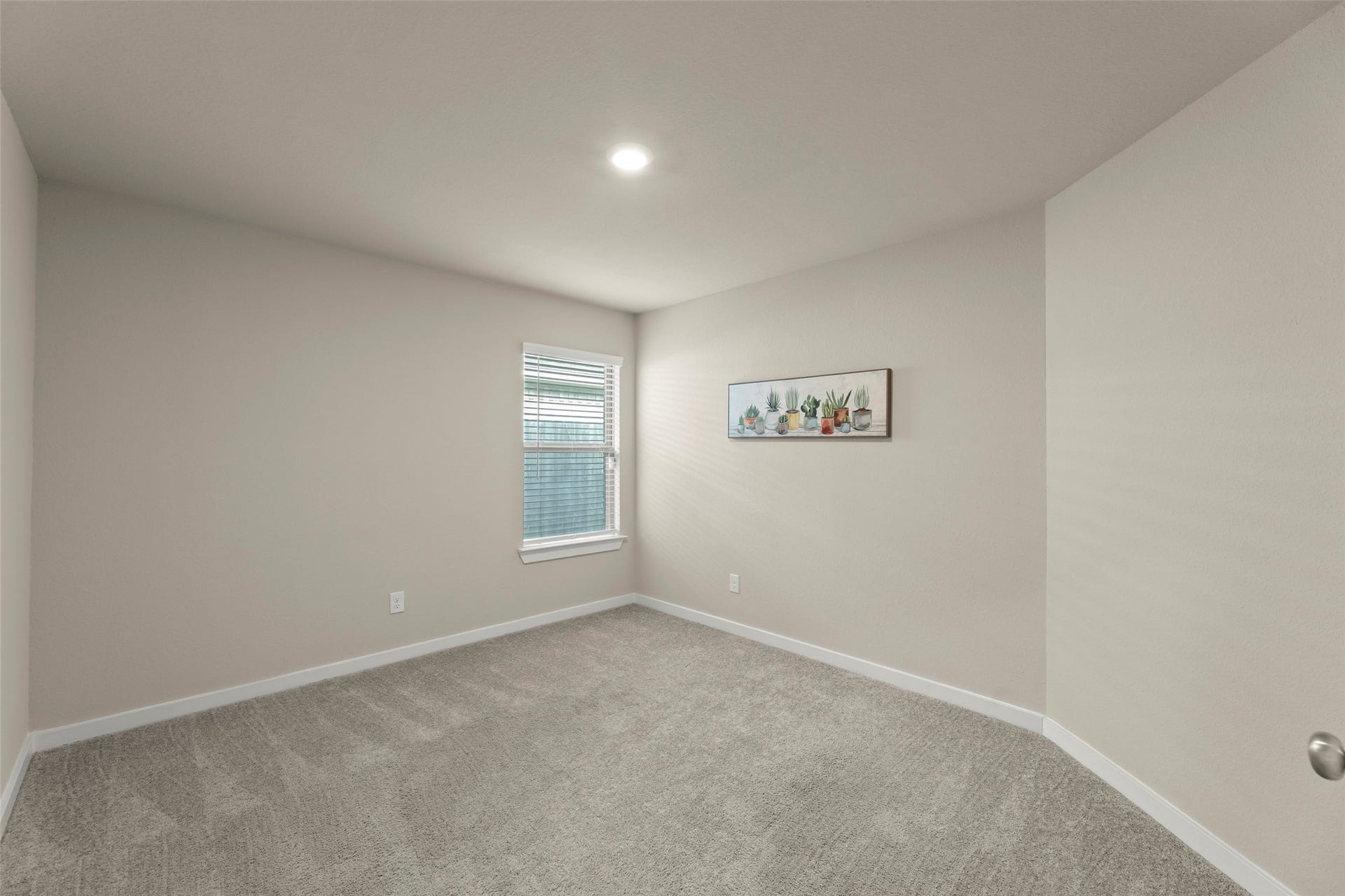 2610 Blue Abbot Drive, Fresno, TX 77545 Lovely room with soft carpeting, neutral walls, and a large window allowing natural light to brighten the space.