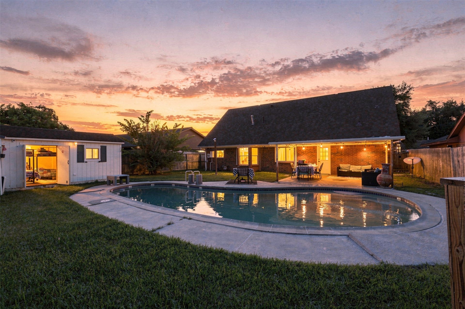 Enjoy your own backyard retreat with a sparkling in-ground pool and plenty of space to relax and unwind.