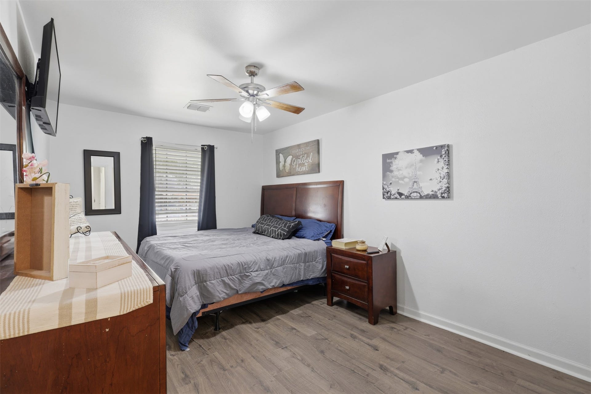 Comfortable secondary bedroom offers flexibility for family, guests, or a home office.