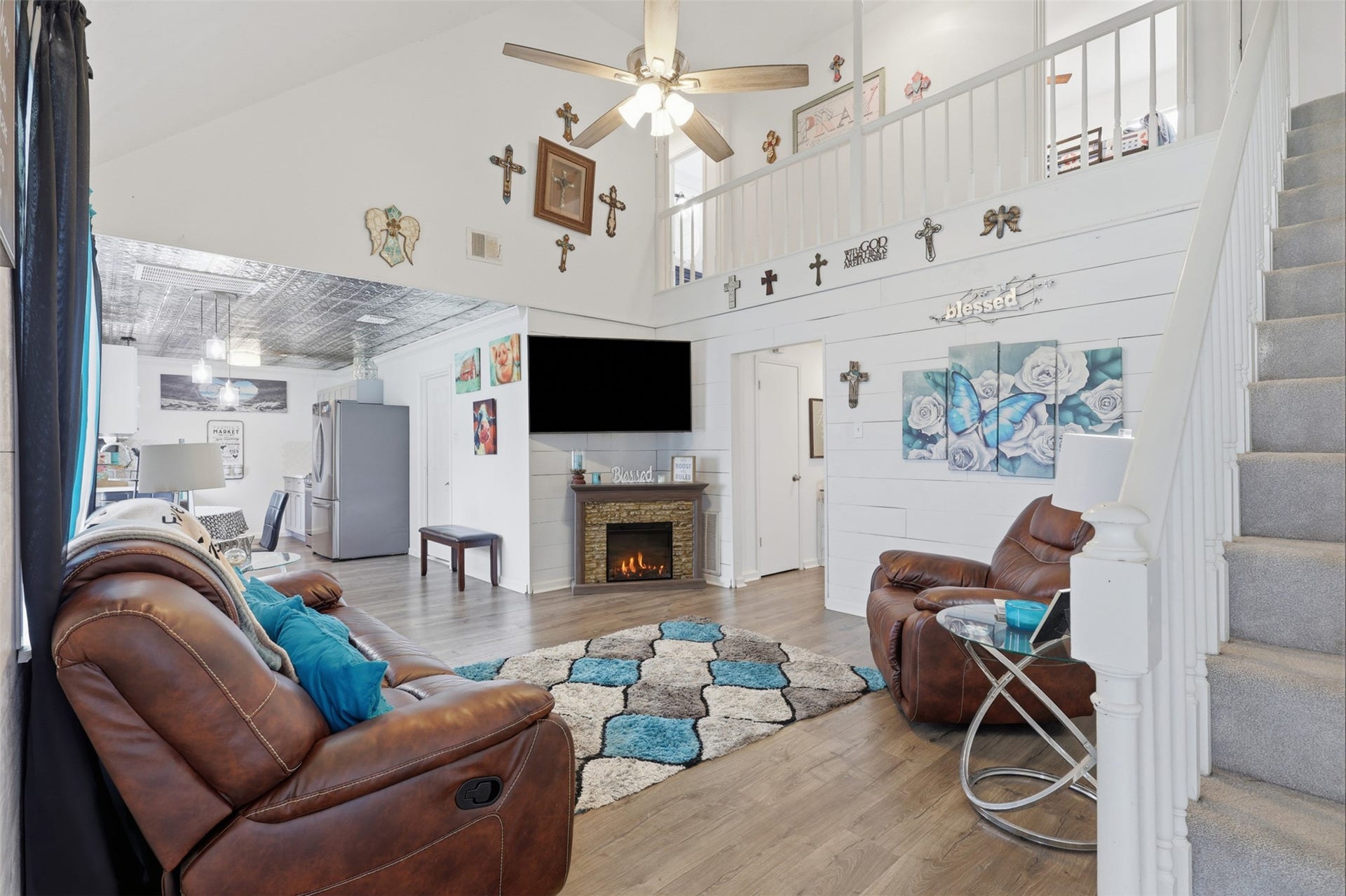Spacious living area offers high ceilings and an open, comfortable setting for everyday living.