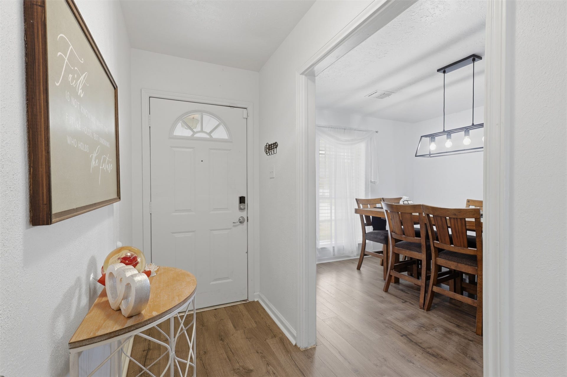 Bright entryway welcomes you inside with easy access to the homes main living and dining spaces.