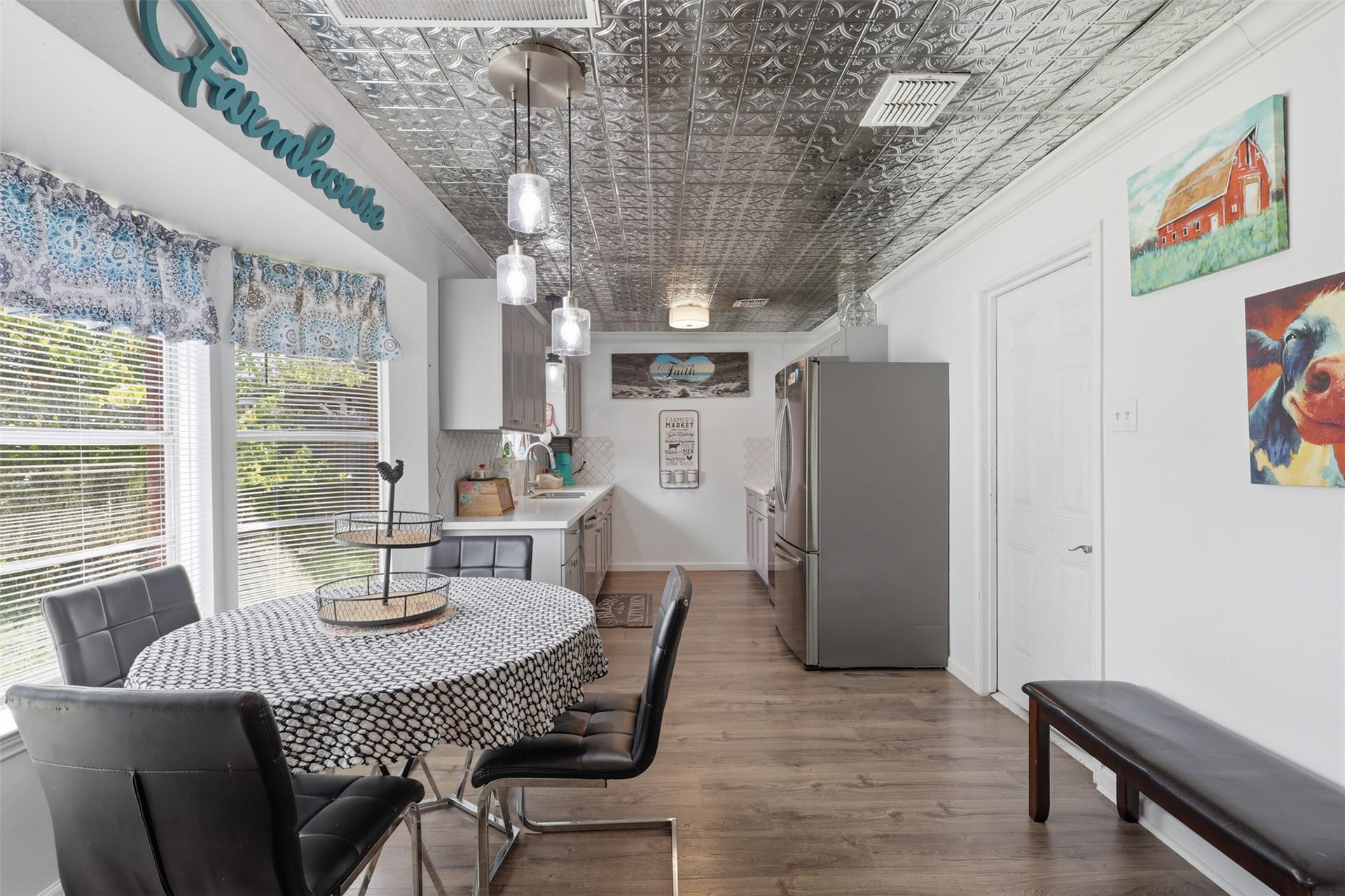 Casual breakfast area filled with natural light and conveniently located near the kitchen.