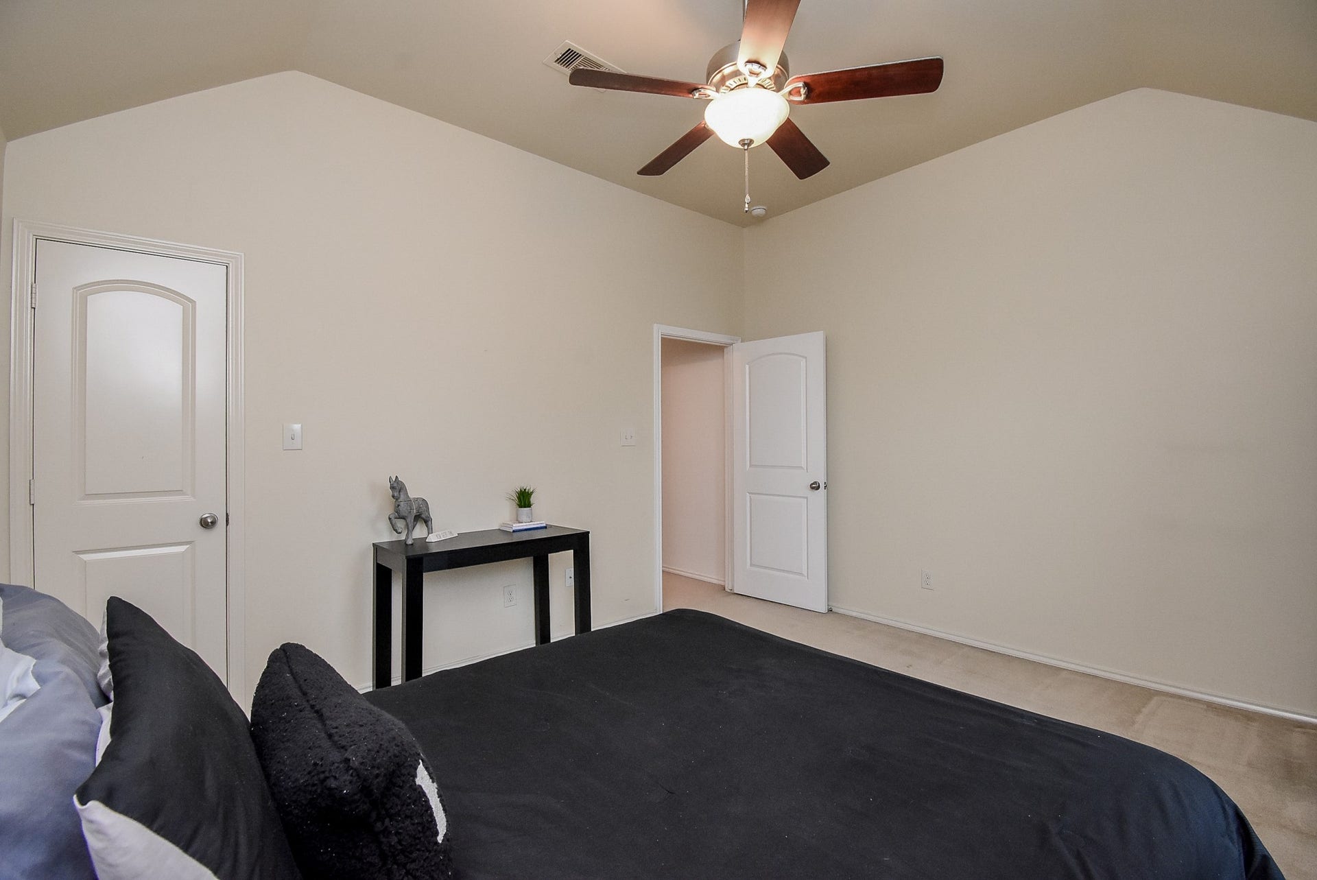 1334 Laura Hills Lane, Spring, TX 77386 Bedroom 2 has a big walk-in closet and a view of the swimming pool!