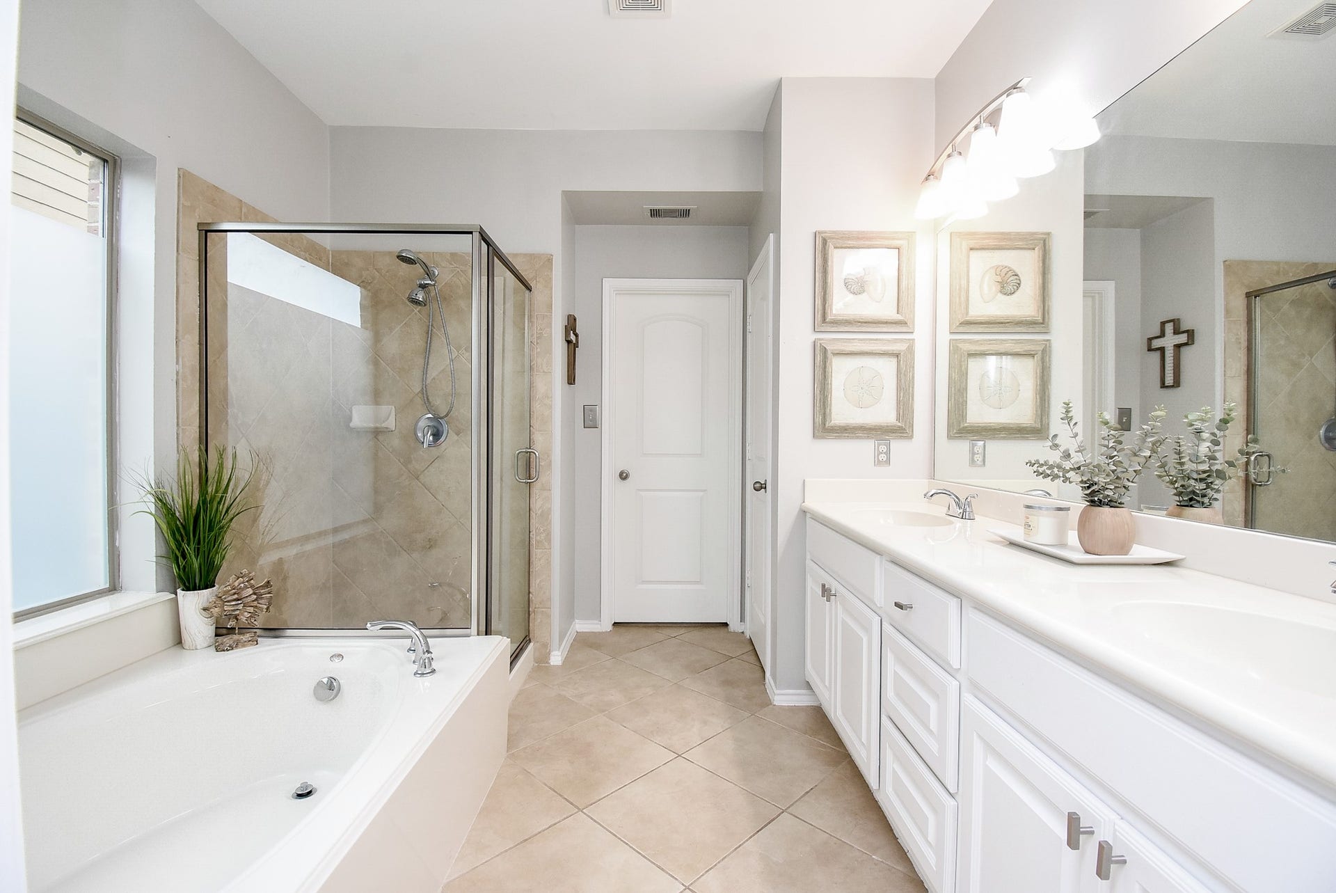 1334 Laura Hills Lane, Spring, TX 77386 Primary bathroom offers double sinks, cabinet storage and drawers!