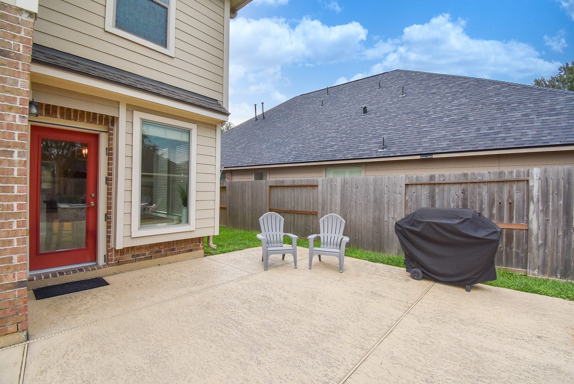 1334 Laura Hills Lane, Spring, TX 77386 Welcome to your backyard vacay! Enjoy extensive Cool Decking on hot summer days!
