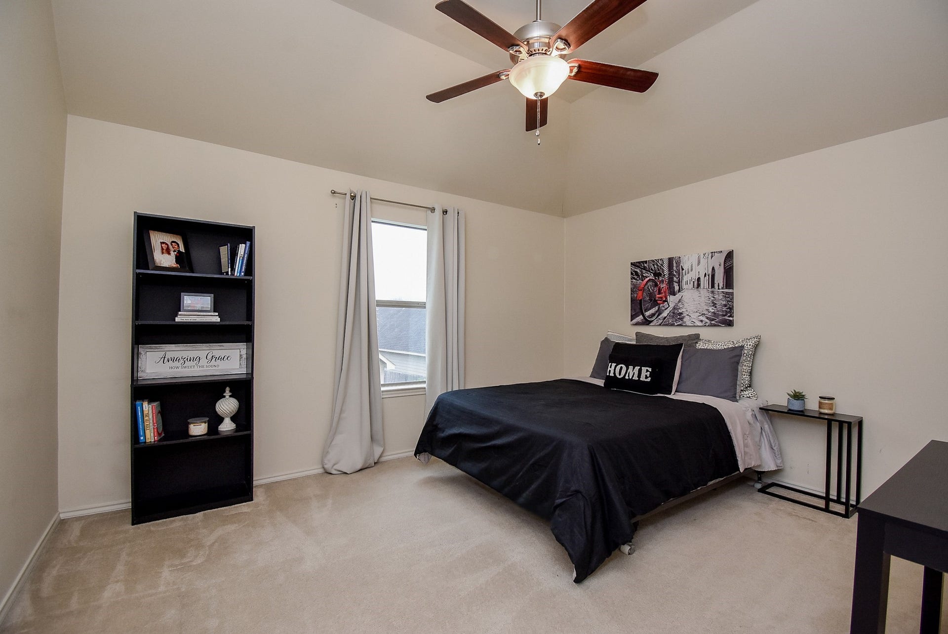 1334 Laura Hills Lane, Spring, TX 77386 Bedroom 2 with ceiling fan and fresh paint!
