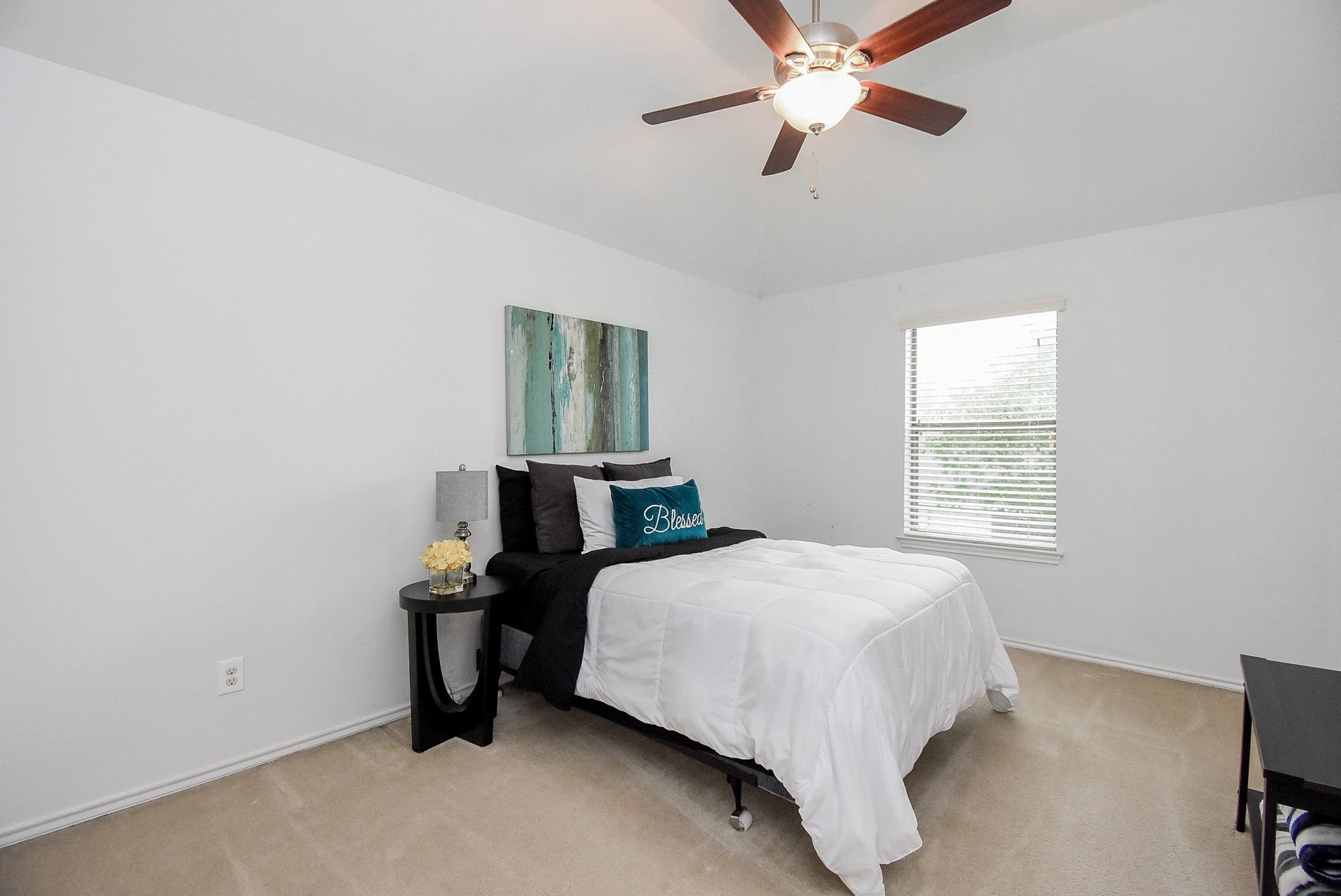 1334 Laura Hills Lane, Spring, TX 77386 Bedroom 3 also has a view of the pool and a ceiling fan!