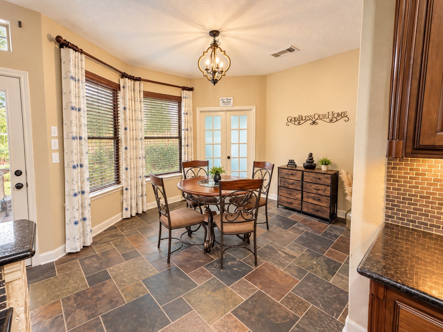 14215 Windy Crossing Lane, Humble, TX 77396 Open kitchen and breakfast area create an inviting space for cooking, dining, and conversation.