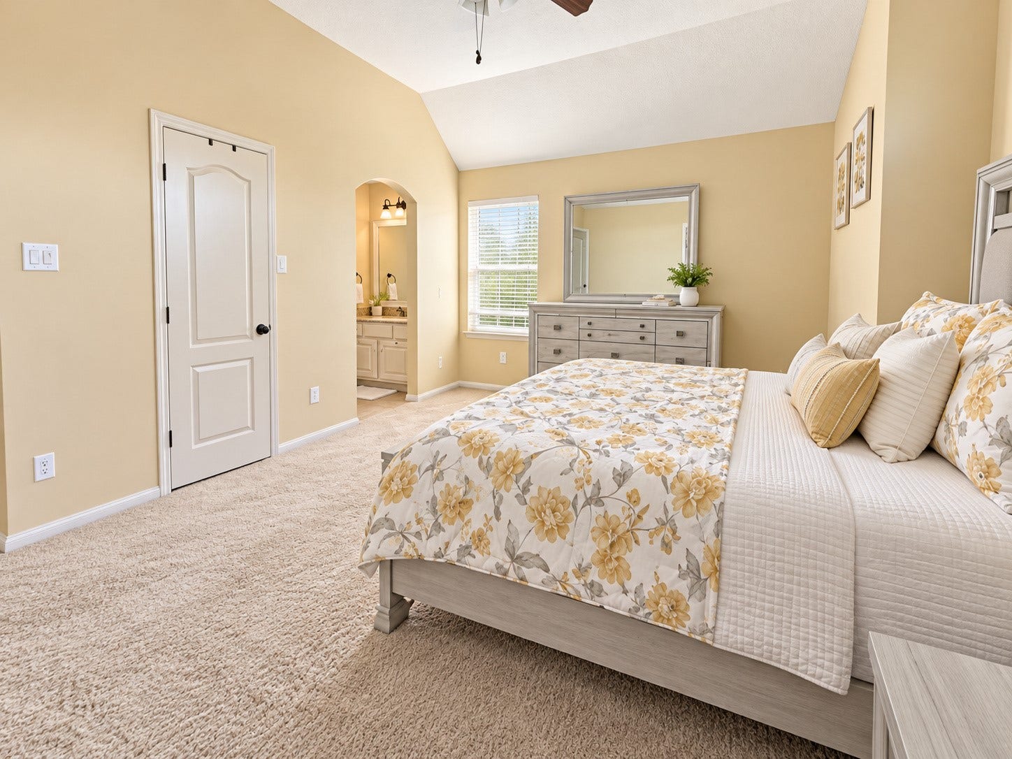 14215 Windy Crossing Lane, Humble, TX 77396 . Beautiful upstairs secondary bedroom featuring neutral finishes, ceiling fan, and spacious layout.