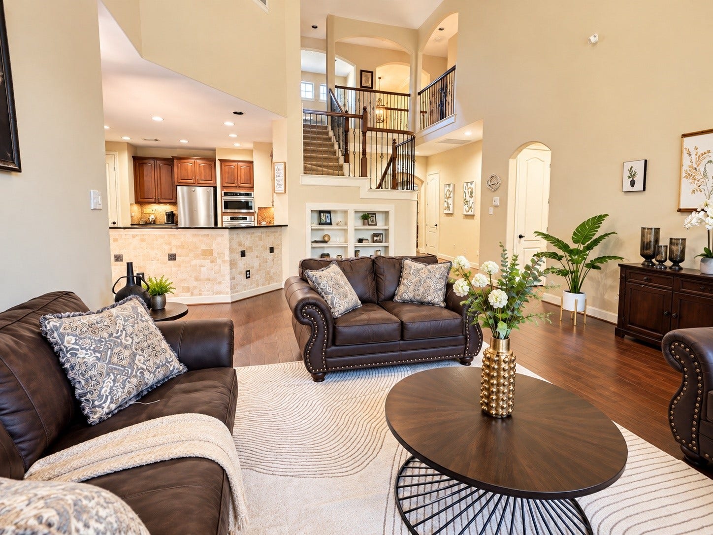 14215 Windy Crossing Lane, Humble, TX 77396 Bright and spacious family room flows effortlessly into the kitchen and breakfast area, creating the perfect space for togetherness.