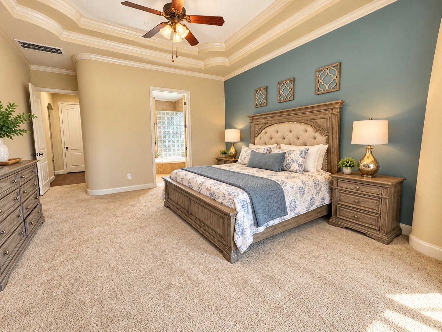 14215 Windy Crossing Lane, Humble, TX 77396 Inviting primary suite with multiple windows overlooking the backyard and mature landscaping.
