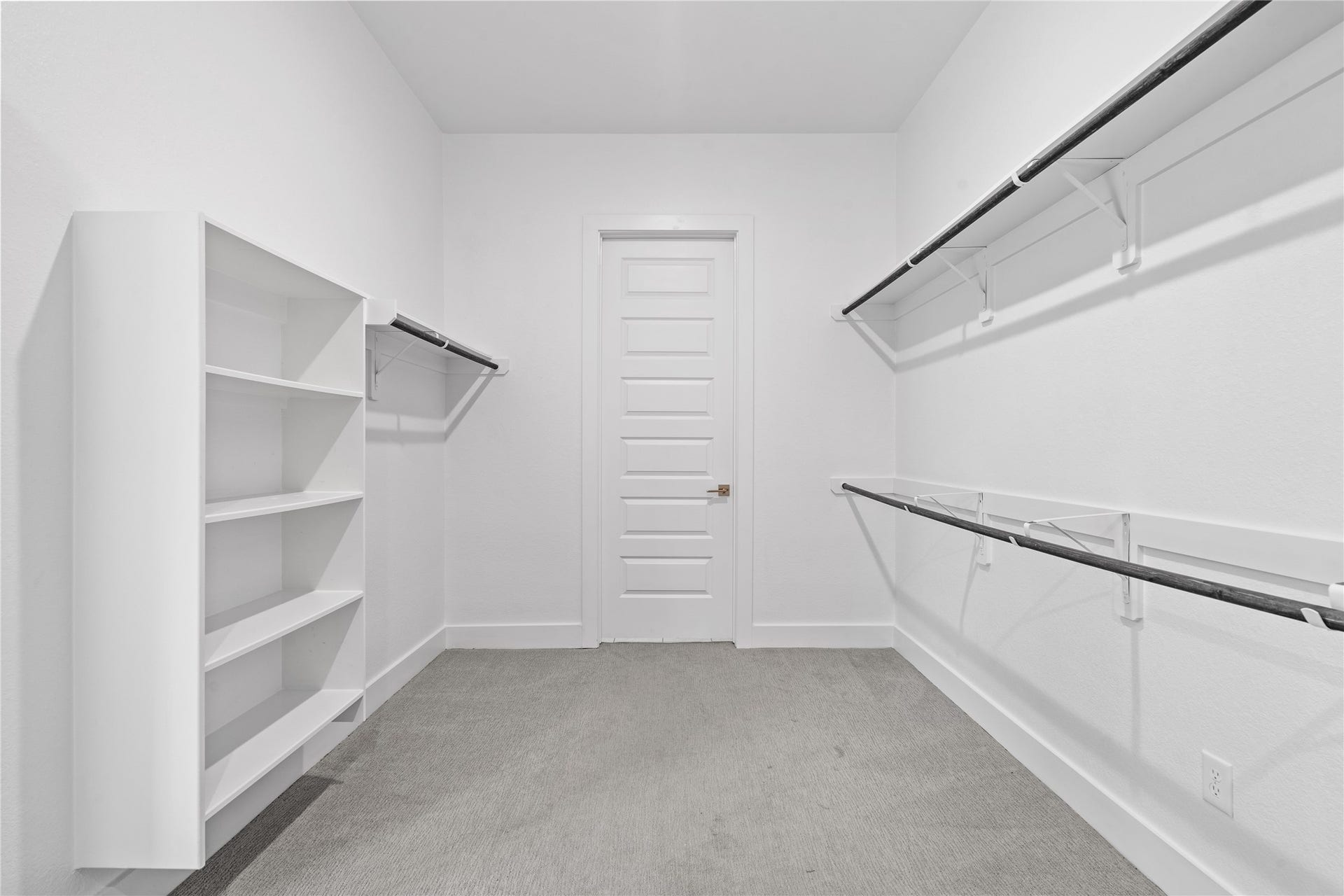 11 Victorian Run, Sugar Land, TX 77498 Spacious walk-in closet designed for optimal organization, featuring multiple hanging areas and built-in shelving. The generous layout provides plenty of room for wardrobe storage and easy accessibility.