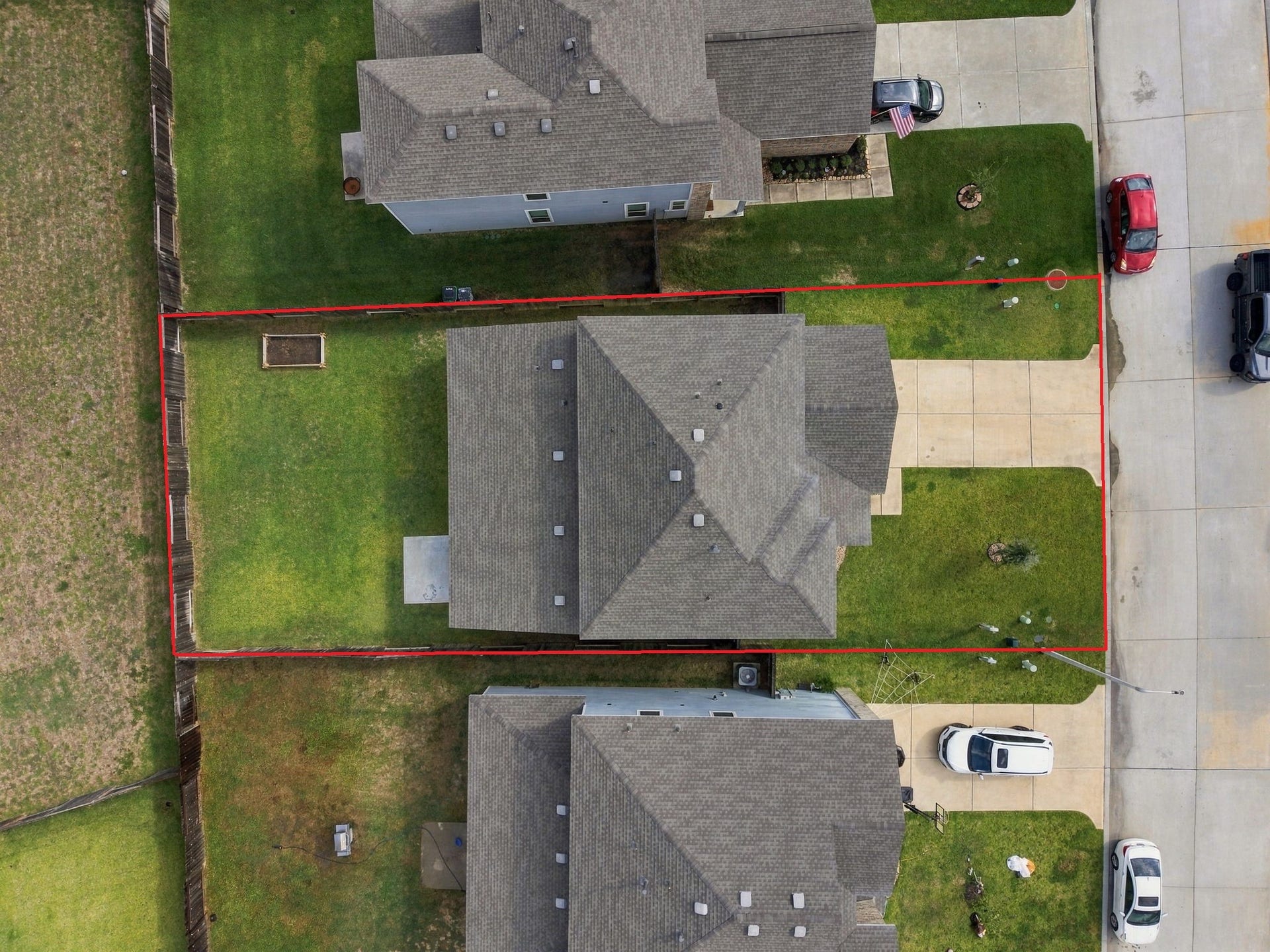 14424 Sunny Bend Way, Conroe, TX 77303 This aerial view showcases a beautiful home situated on a 6,464-square-foot lot, offering a spacious backyard and a well-defined property layout.