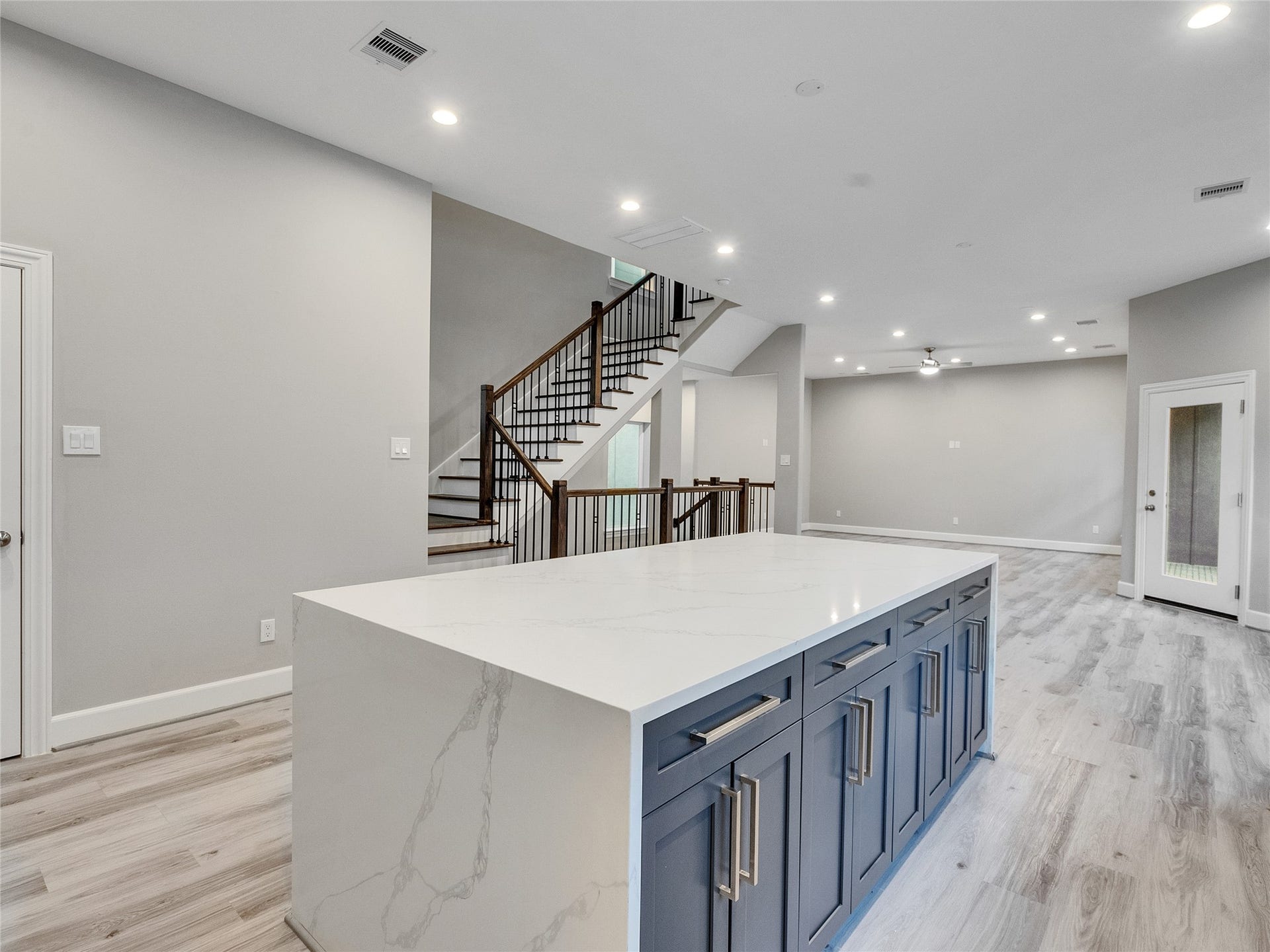 1122 W 16th Street, #C, Houston, TX 77008 Kitchen island equipped with ample storage space