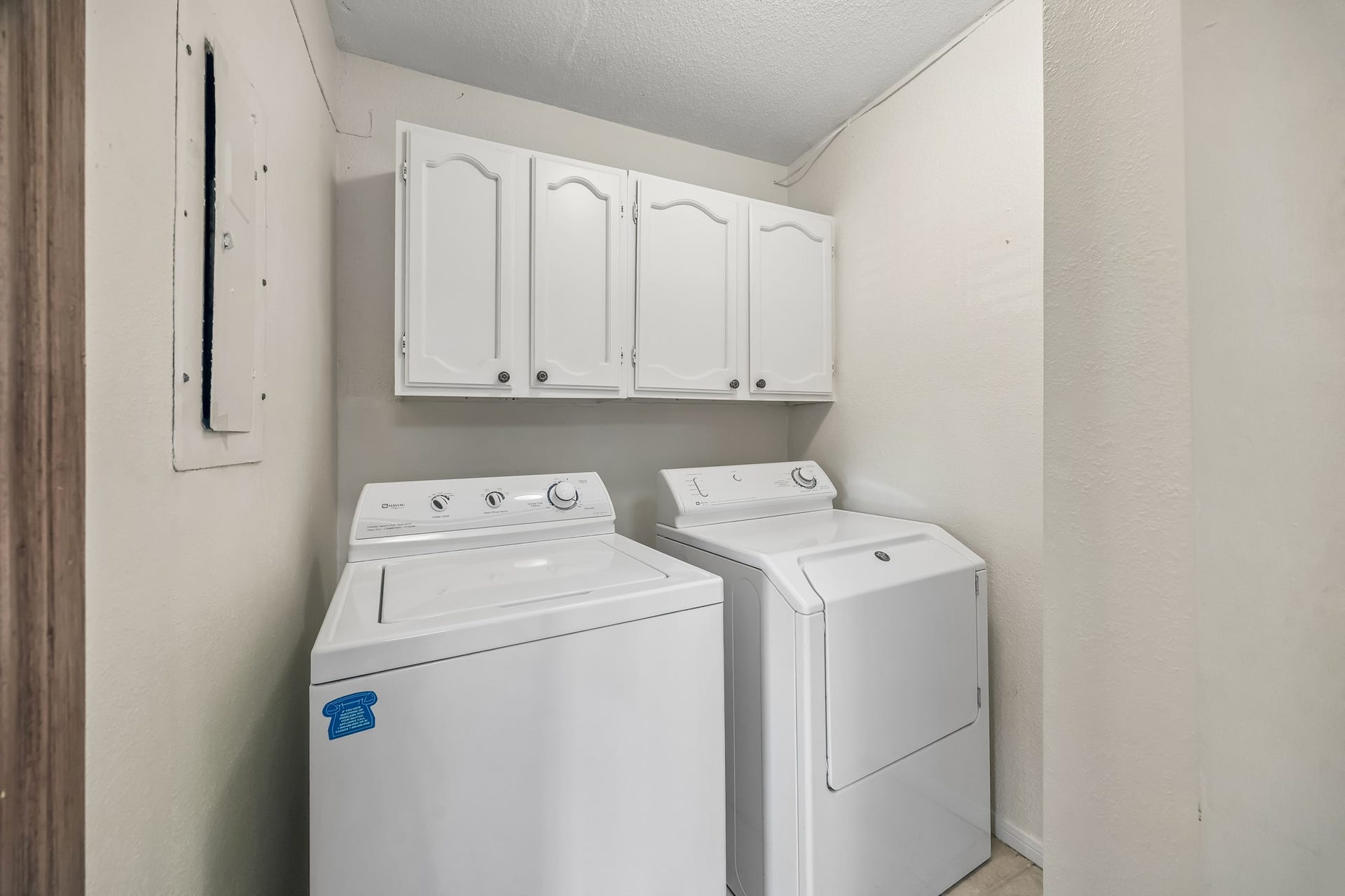 2515 Bering Drive, #1, Houston, TX 77057 Utility room in home with additional storage