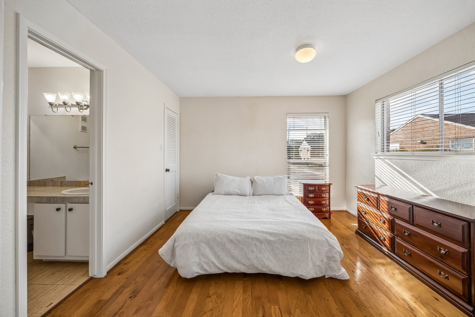 2515 Bering Drive, #1, Houston, TX 77057 Second bedroom with hardwood floors and two walk in closets