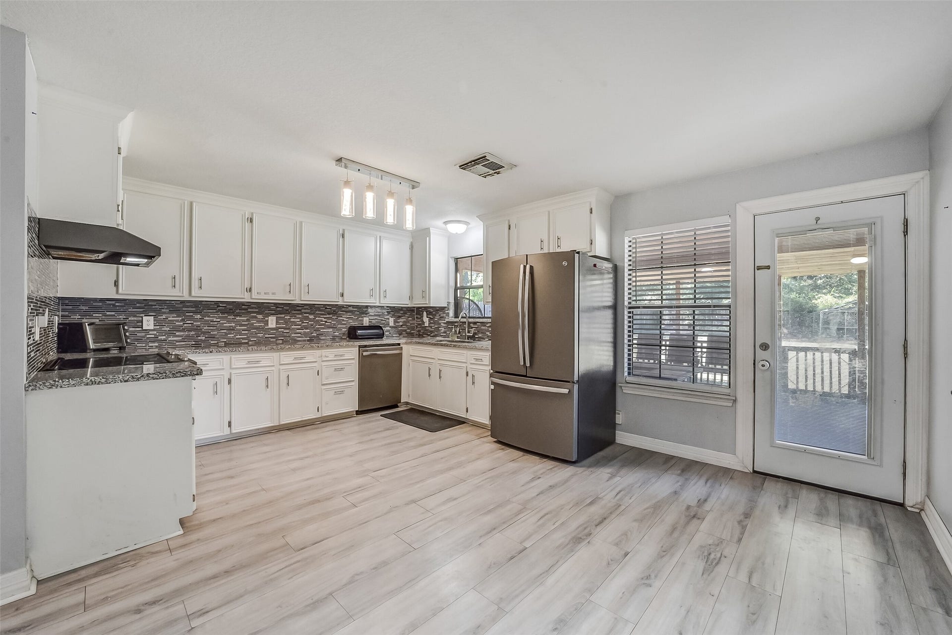 22911 Keith Drive, New Caney, TX 77357 Generous counter space and ample storage provide everyday convenience. Refrigerator is included.