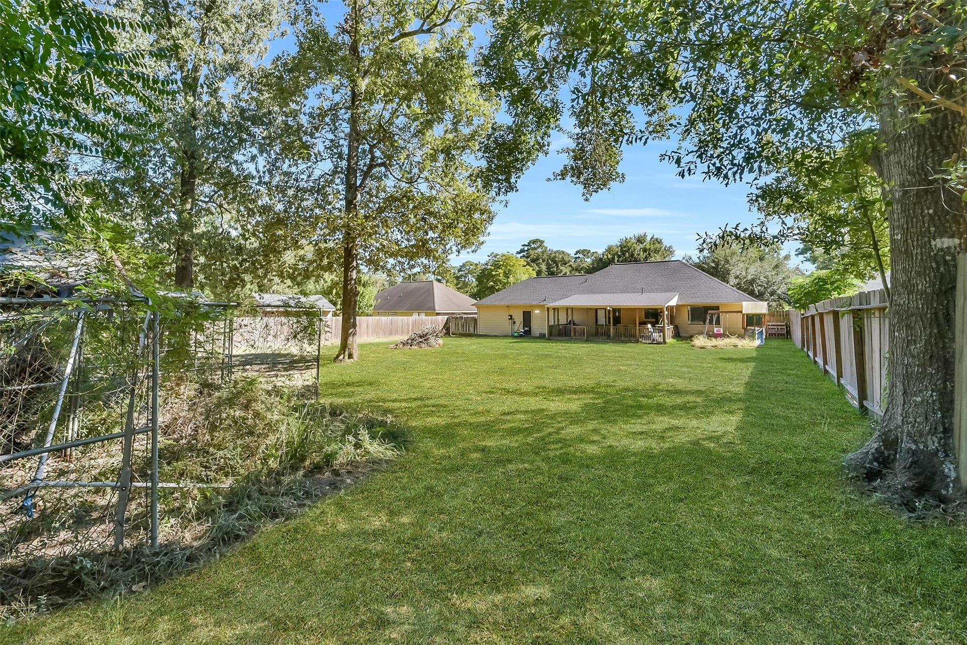 22911 Keith Drive, New Caney, TX 77357 Backyard is big enough for all your outdoor needs and activities.