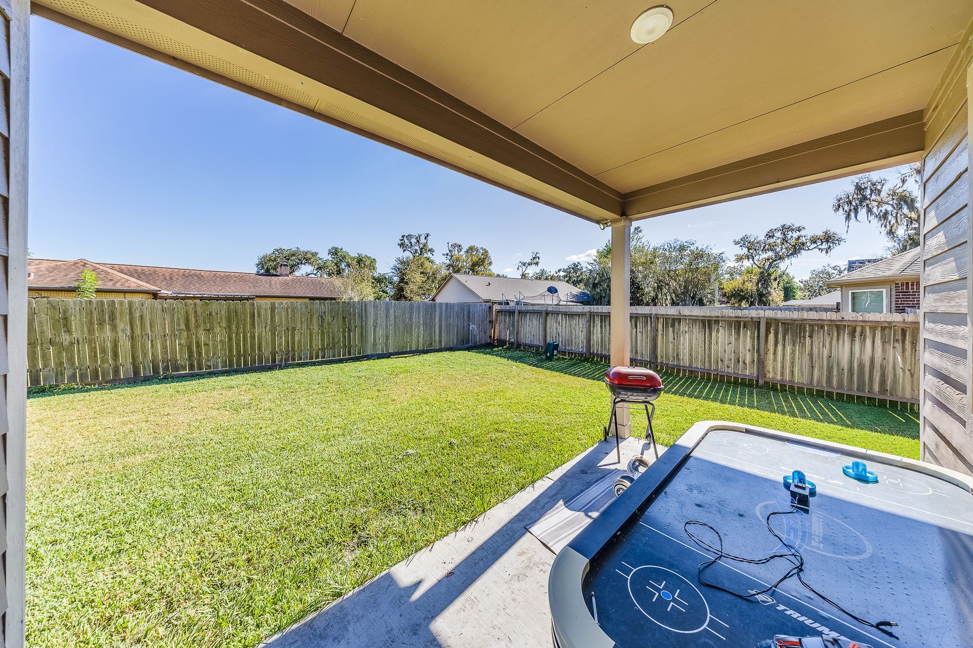 267 Freeman Boulevard, West Columbia, TX 77486 Sip your morning coffee in the shade while overlooking your backyard.