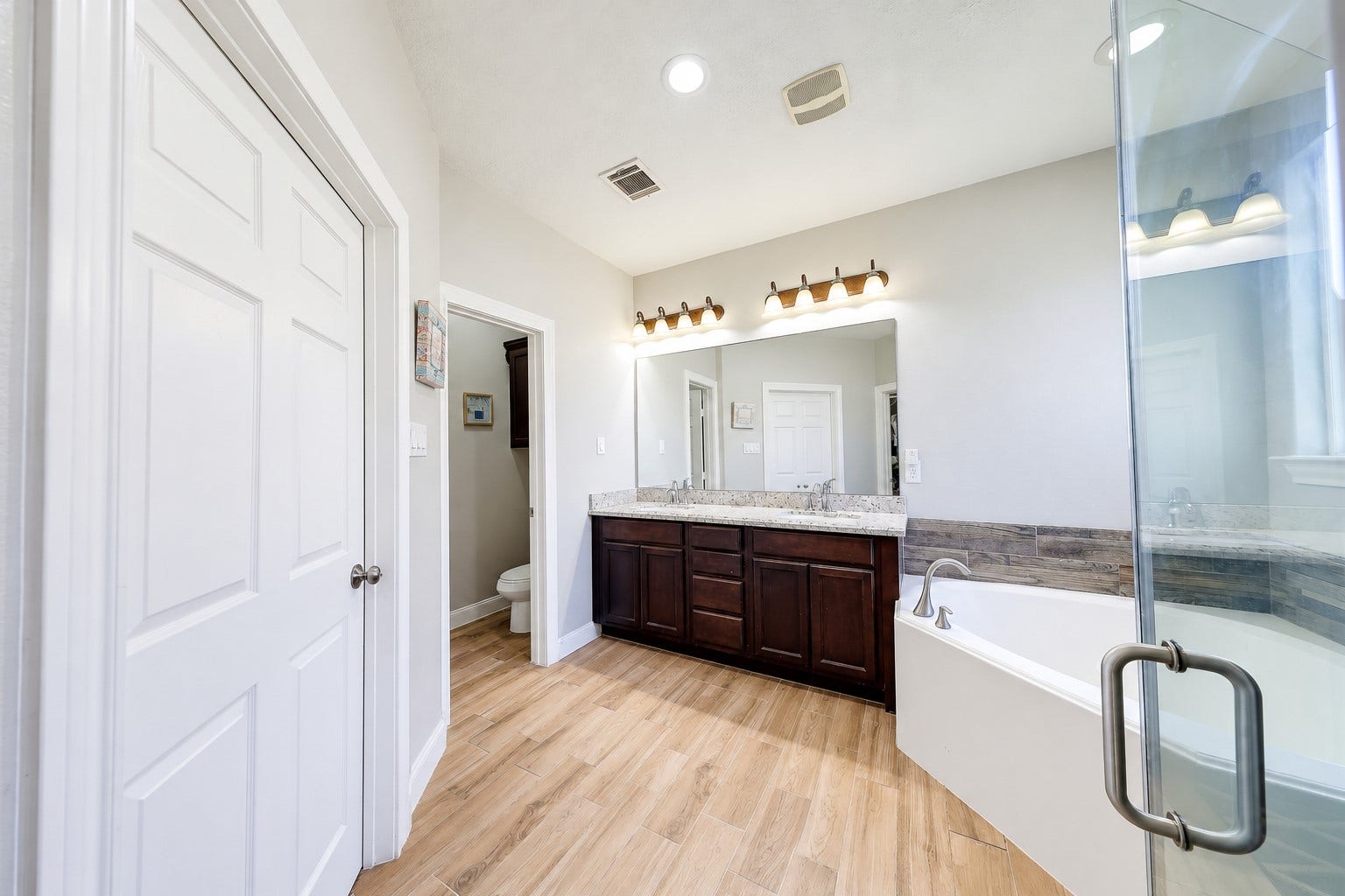 267 Freeman Boulevard, West Columbia, TX 77486 Start your mornings with the convenience of a spacious double vanity.