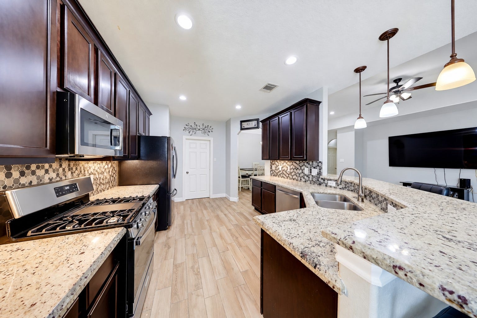 267 Freeman Boulevard, West Columbia, TX 77486 Prepare favorite recipes while guests pull up a seat at the breakfast bar.