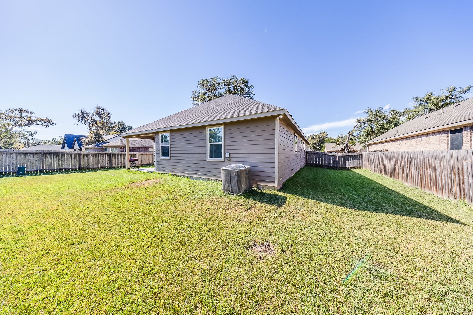 267 Freeman Boulevard, West Columbia, TX 77486 Make room for outdoor fun in a spacious backyard with a covered spot to relax.