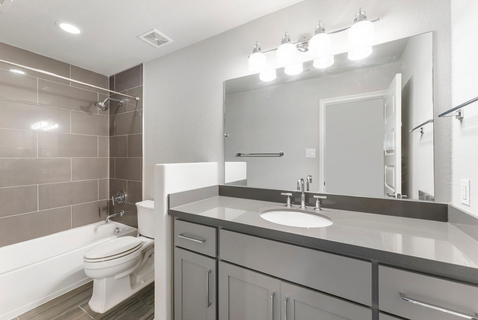 Two secondary bedrooms share this secondary bathroom.