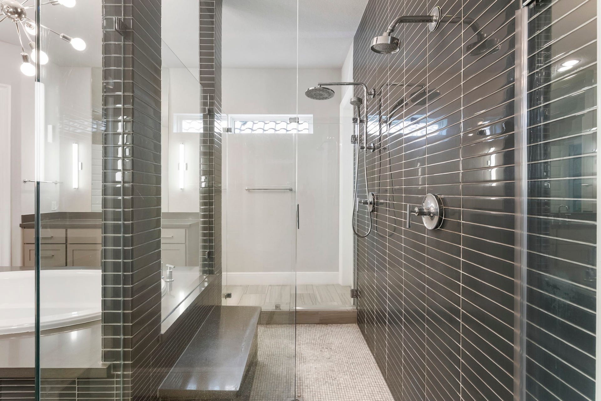 Dual shower heads in the oversized showr.
