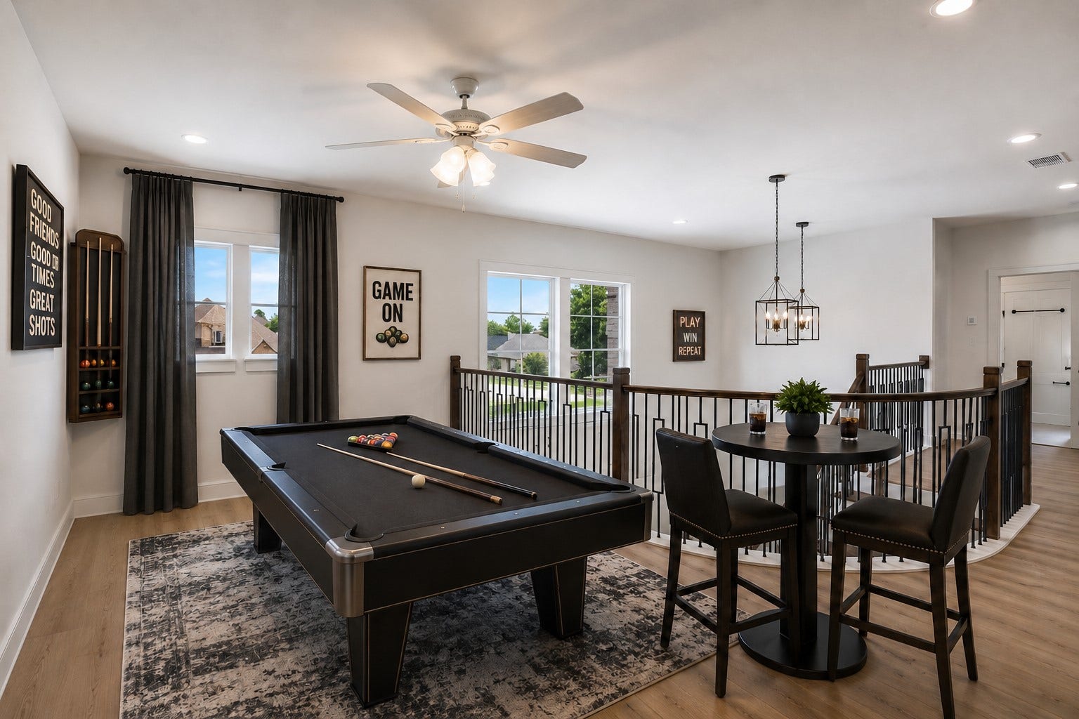 205 Wyndemere Drive, Montgomery, TX 77356 Virtually stage gameroom. Curtains are virtually staged to help see all the possibilities.