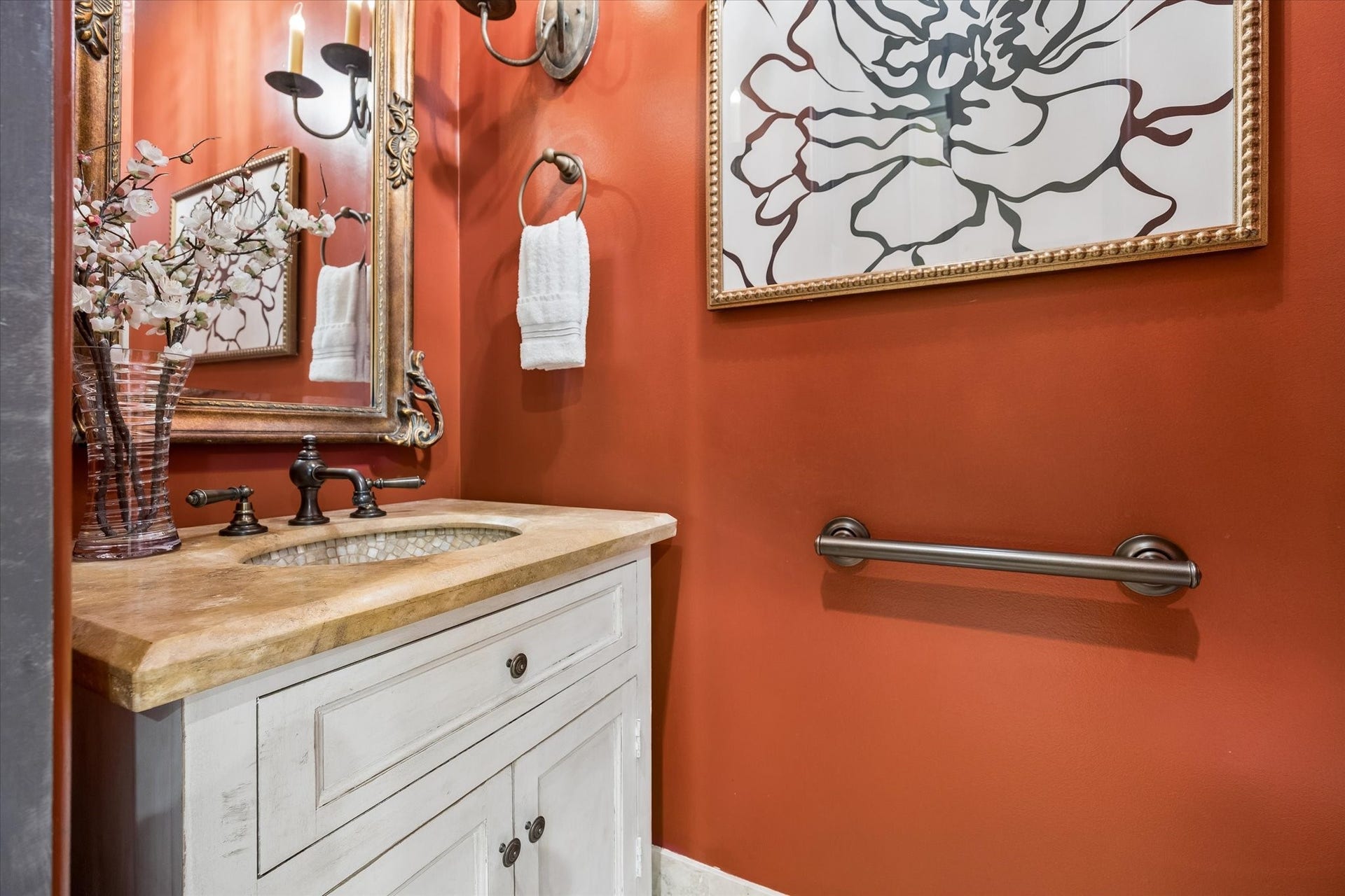 5120 Mt Vernon, Houston, TX 77006 Downstairs powder room (note the beautiful sink) conveys with the custom mirror.