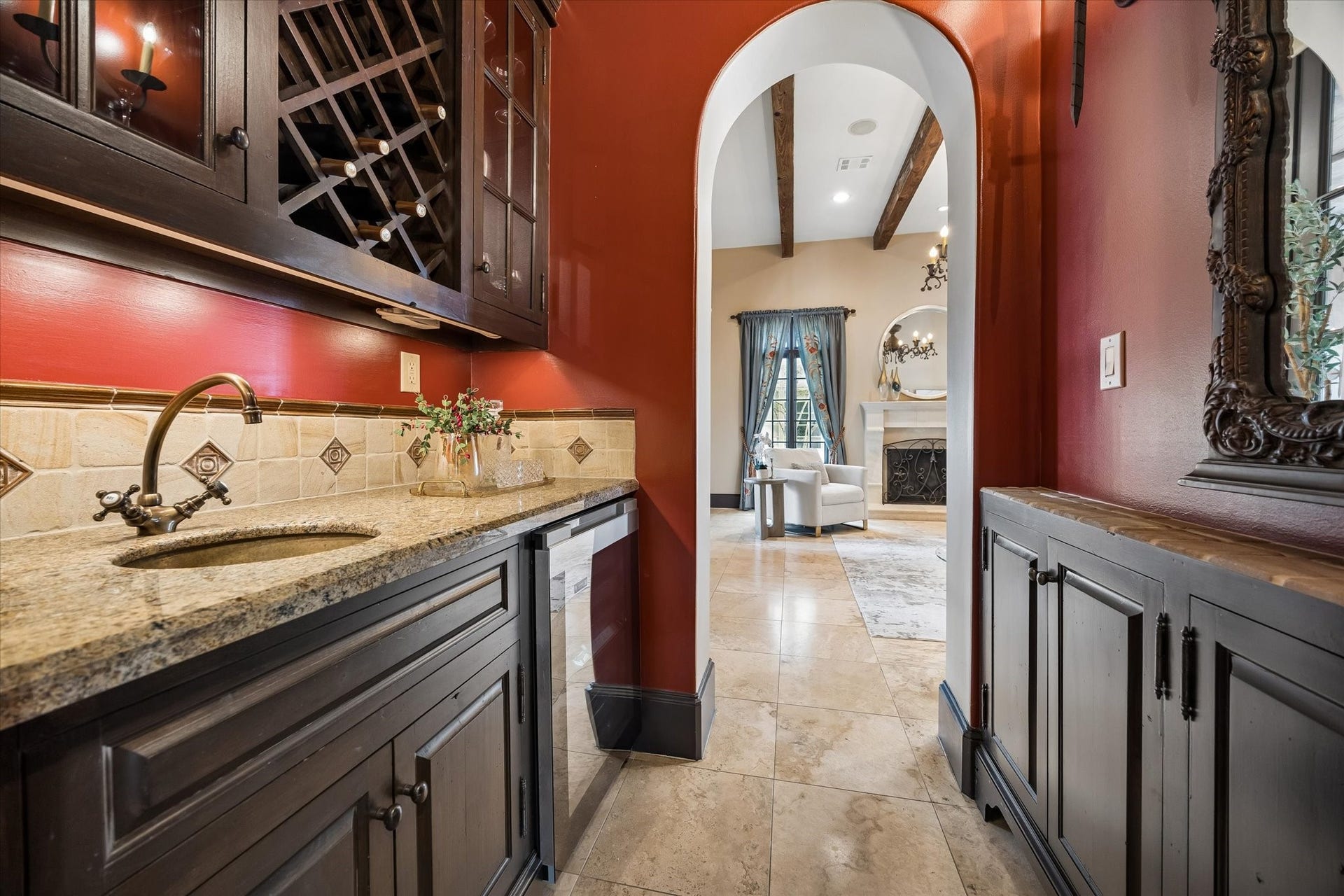 5120 Mt Vernon, Houston, TX 77006 The beautiful wet bar located between the living room and family room. Plenty of storage and a wine cooler.