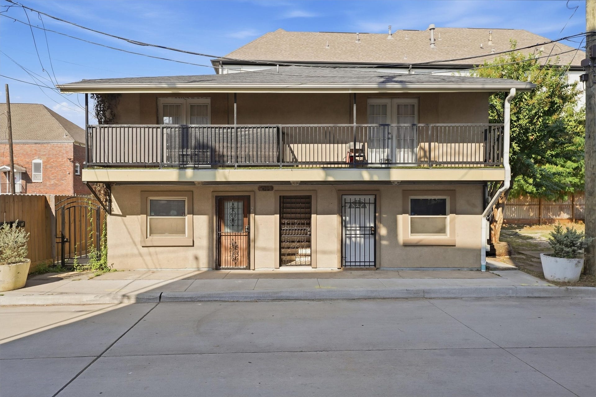 1017 Court Street, Houston, TX 77007 Front view of quadplex, two units upstairs and two units downstair.