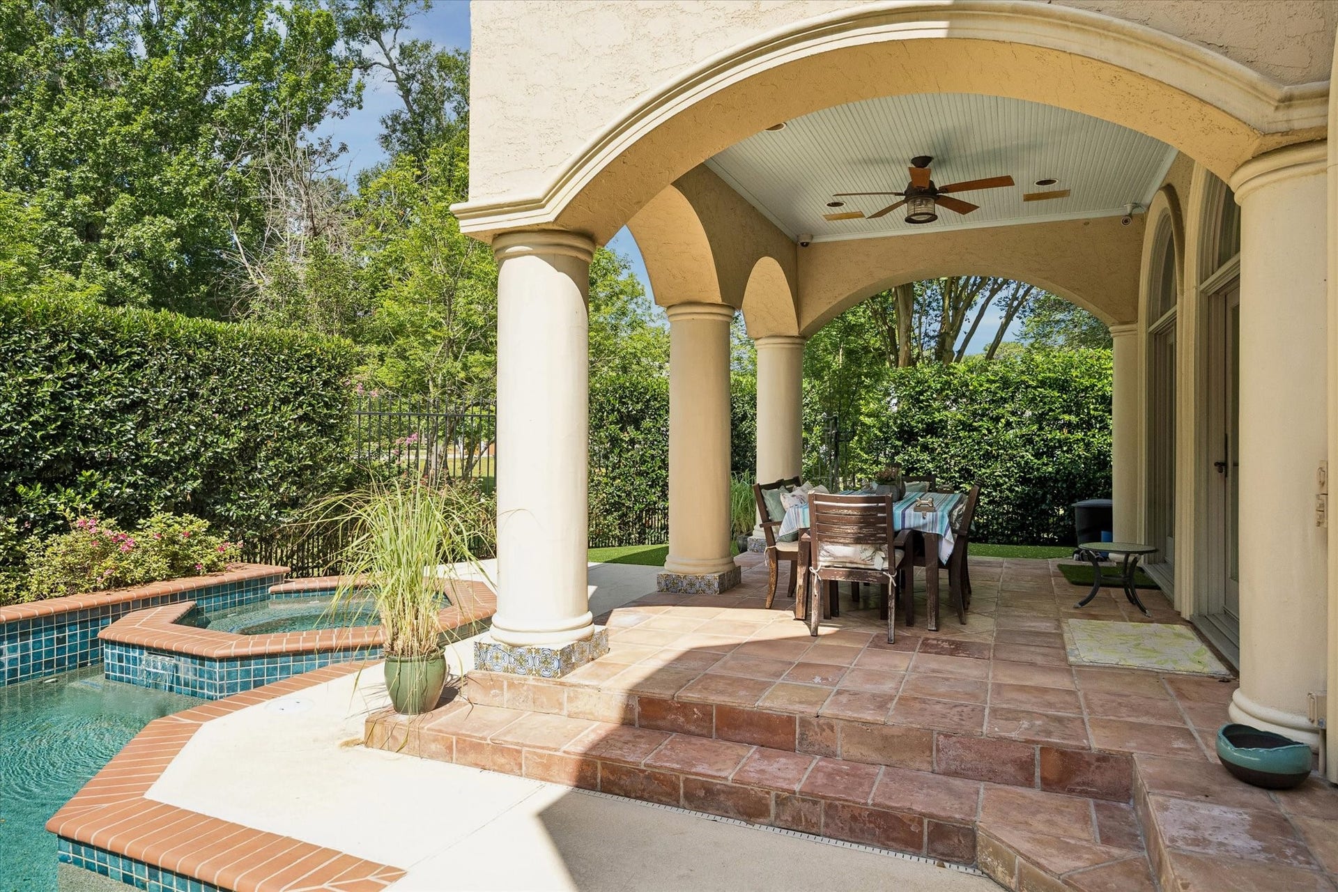 Closer view of the covered patio and spa.
