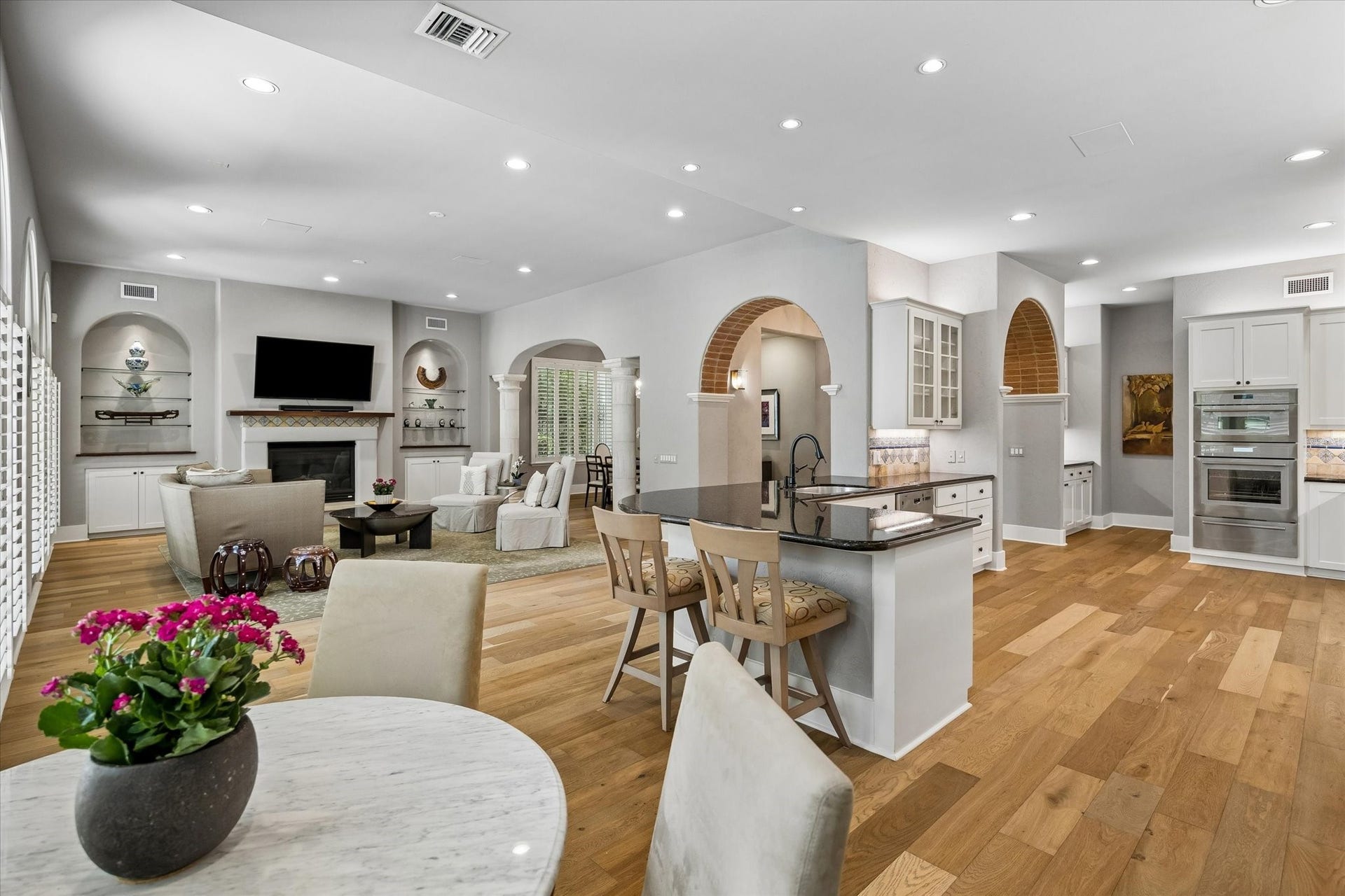 View from the breakfast room to the open kitchen and family room.