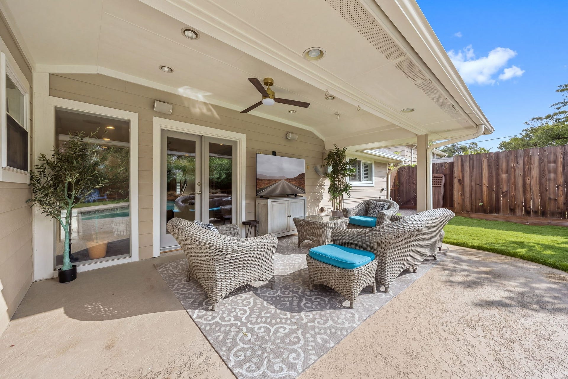 10831 Britoak Lane, Houston, TX 77079 The covered patio, just off the living room is perfect for entertaining and enjoying the pool and backyard.