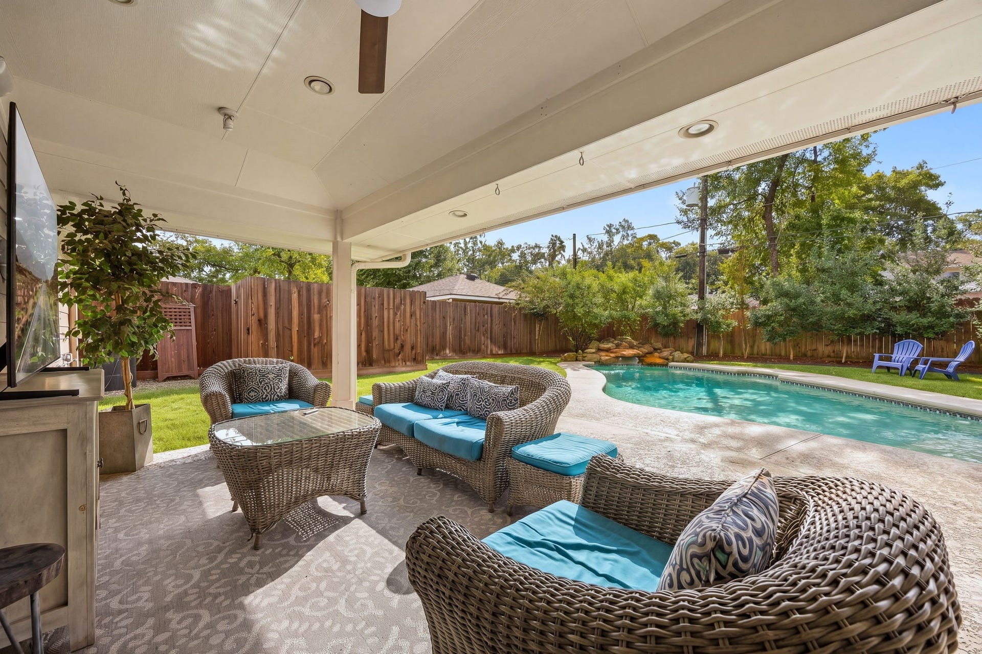 10831 Britoak Lane, Houston, TX 77079 The covered patio is perfect for entertaining and enjoying the pool.